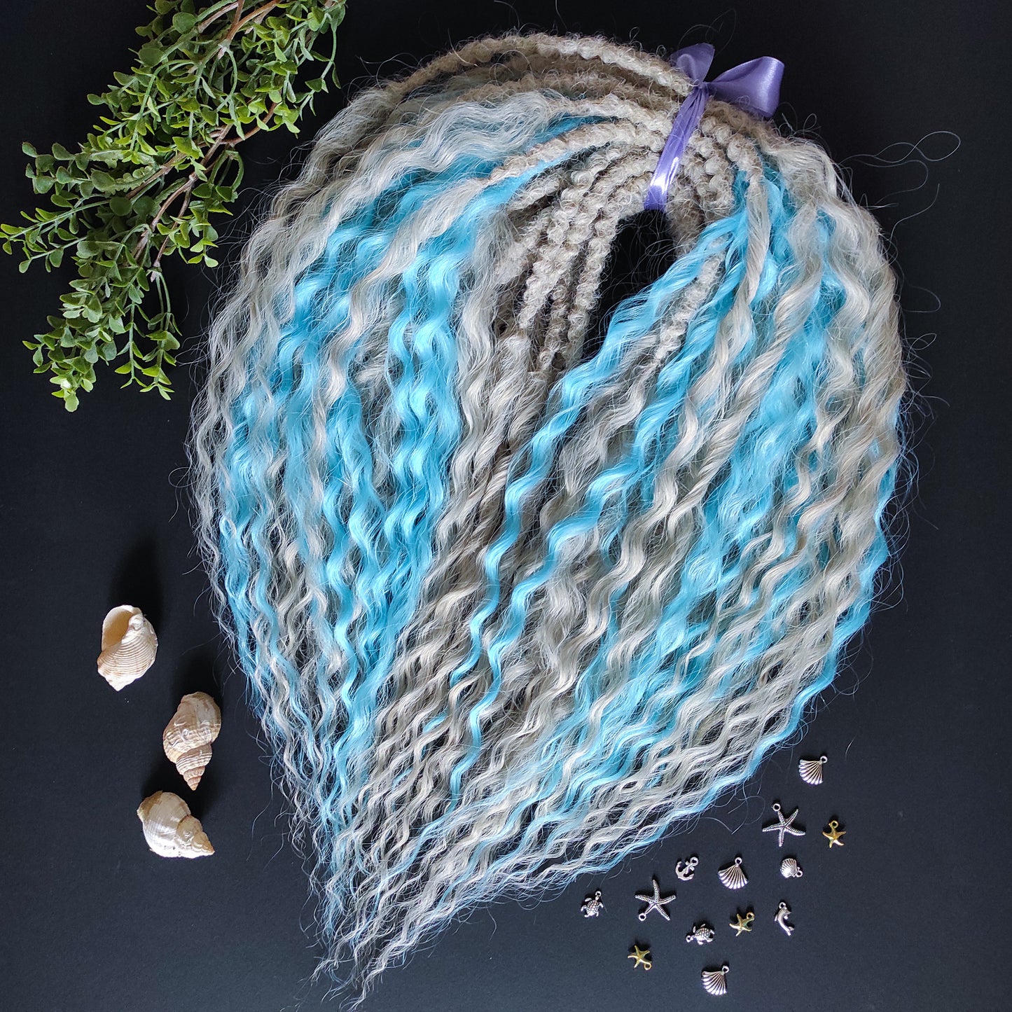 This is a soft, lightweight, and reusable synthetic set of double-ended regular curls (NOT BRUSHABLE) in a mix of platinum blonde and blue.