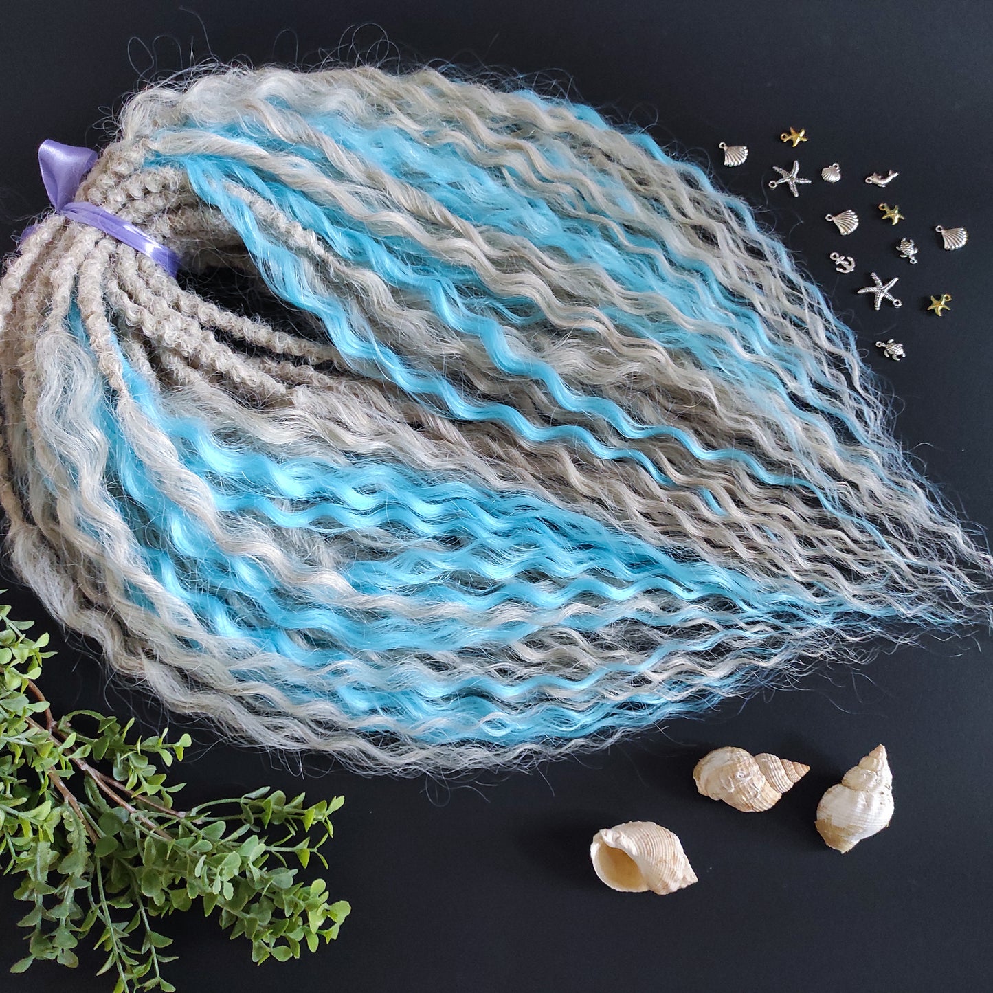 This is a soft, lightweight, and reusable synthetic set of double-ended regular curls (NOT BRUSHABLE) in a mix of platinum blonde and blue.