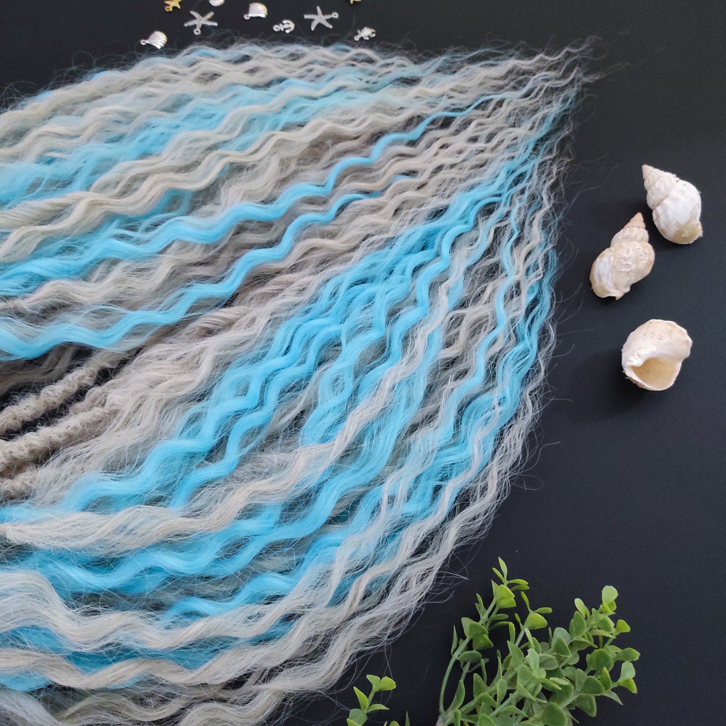 This is a soft, lightweight, and reusable synthetic set of double-ended regular curls (NOT BRUSHABLE) in a mix of platinum blonde and blue.