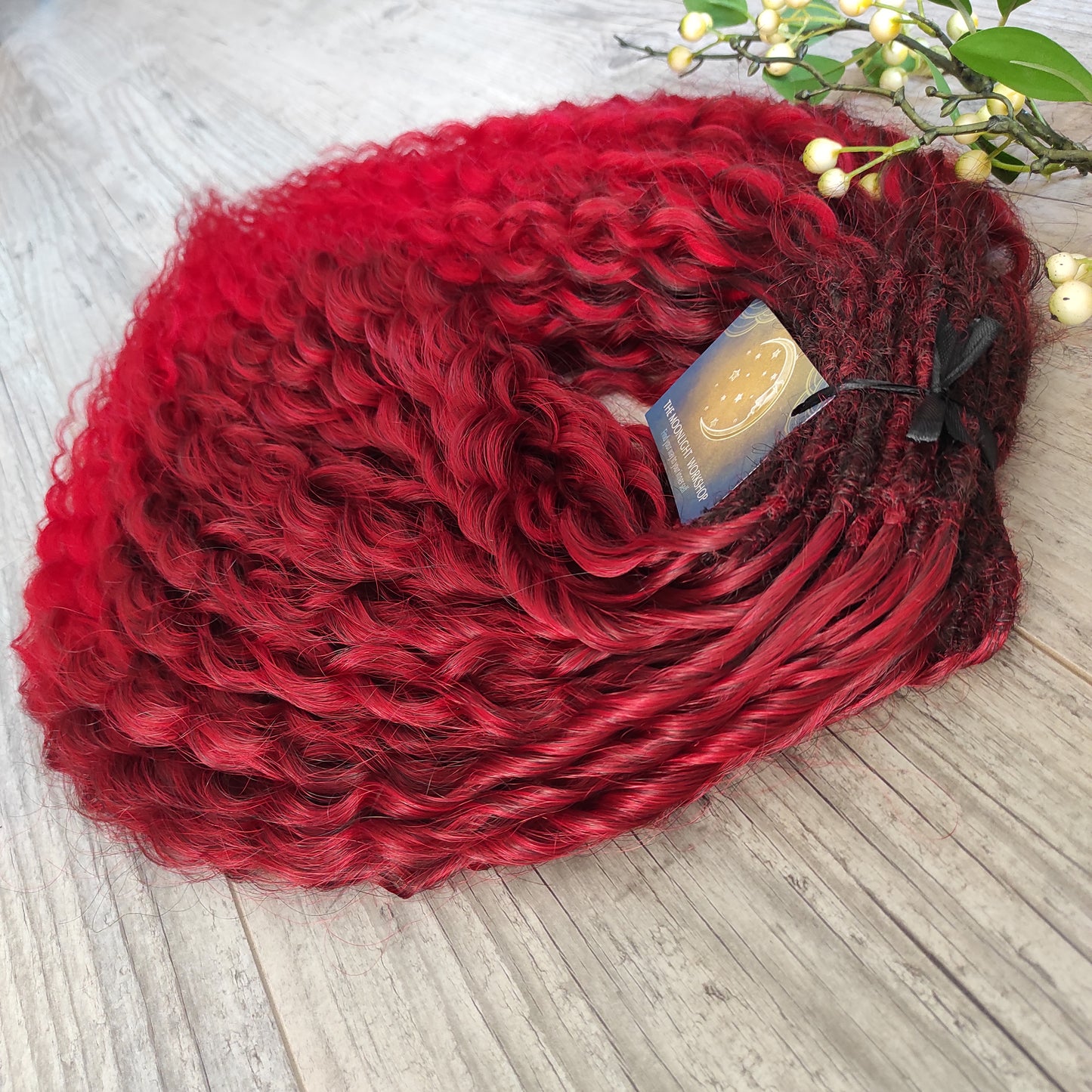 Ombre from dark to bloody red, soft, lightweight, and reusable synthetic double ended regular curls (NOT BRUSHABLE).