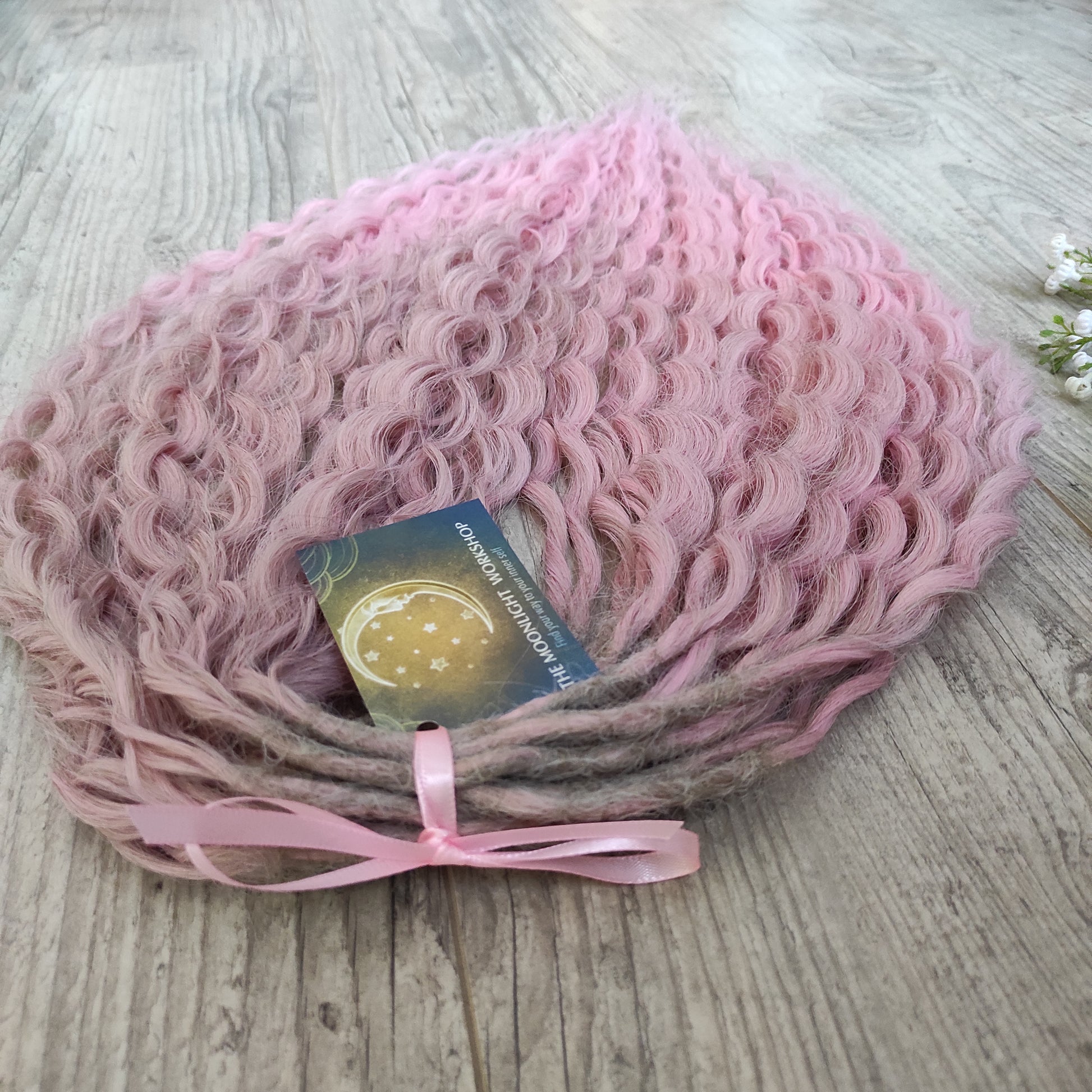 Dusty Rose features a soft pink ombré that fades beautifully from ash dusty rose roots to clean, pastel pink ends. The subtle gradient adds depth and a natural look, while maintaining a romantic, feminine tone.