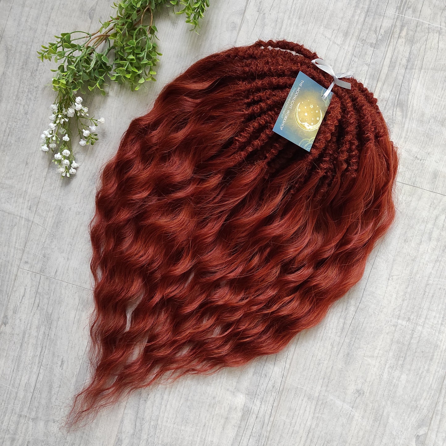 This rich, earthy shade of deep rusty red blends fiery energy with natural elegance — perfect for those who want a bold yet grounded look. Soft, lightweight, and reusable synthetic dreaded curls (standard dreaded, braided middle or push-up). Natural-looking waves let you brush these curls, which keeps them looking good longer!