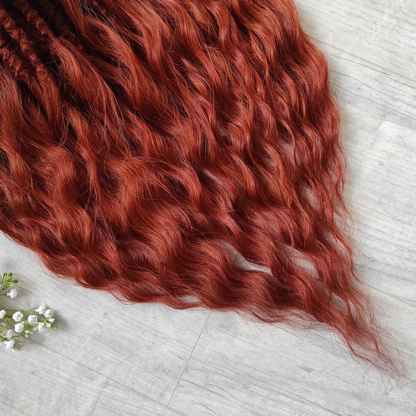 This rich, earthy shade of deep rusty red blends fiery energy with natural elegance — perfect for those who want a bold yet grounded look. Soft, lightweight, and reusable synthetic dreaded curls (standard dreaded, braided middle or push-up). Natural-looking waves let you brush these curls, which keeps them looking good longer!
