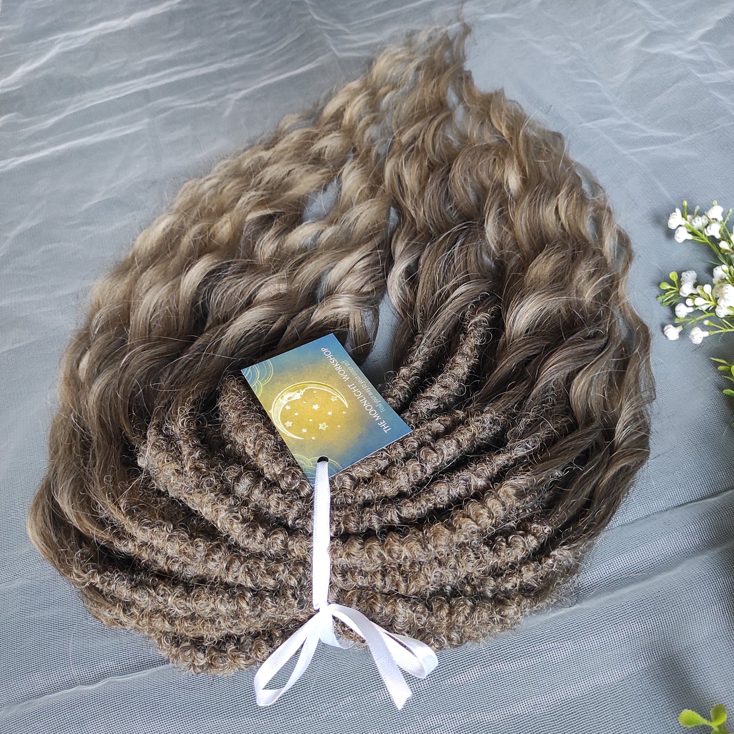 Ash ombre from light brown to wheat blonde soft, lightweight, and reusable synthetic brushable double ended wavy dreadlocks (regular dreaded, braided middle or push-up).