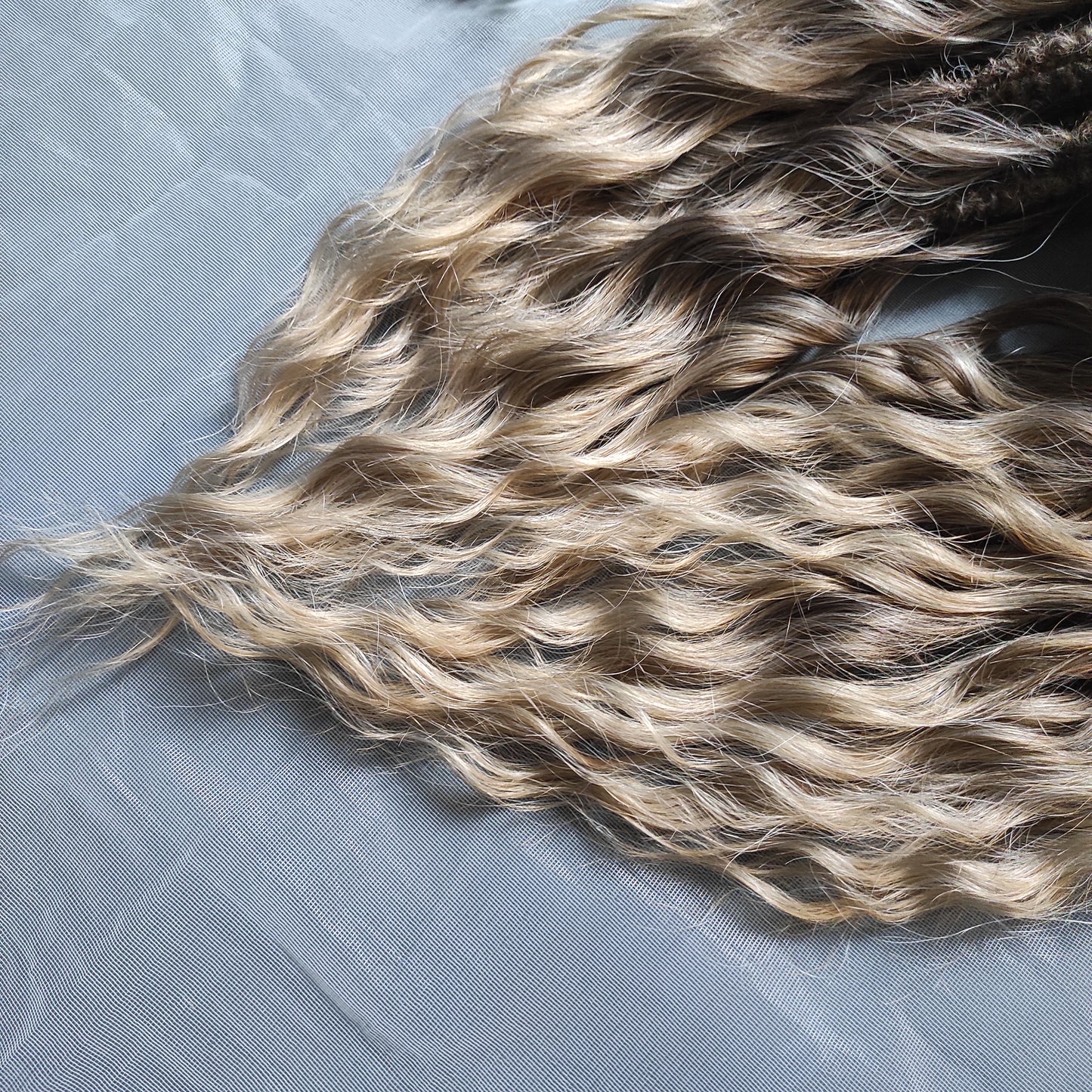 Ash ombre from light brown to wheat blonde soft, lightweight, and reusable synthetic brushable double ended wavy dreadlocks (regular dreaded, braided middle or push-up).