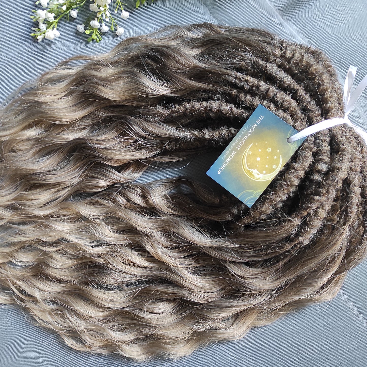 Ash ombre from light brown to wheat blonde soft, lightweight, and reusable synthetic brushable double ended wavy dreadlocks (regular dreaded, braided middle or push-up).