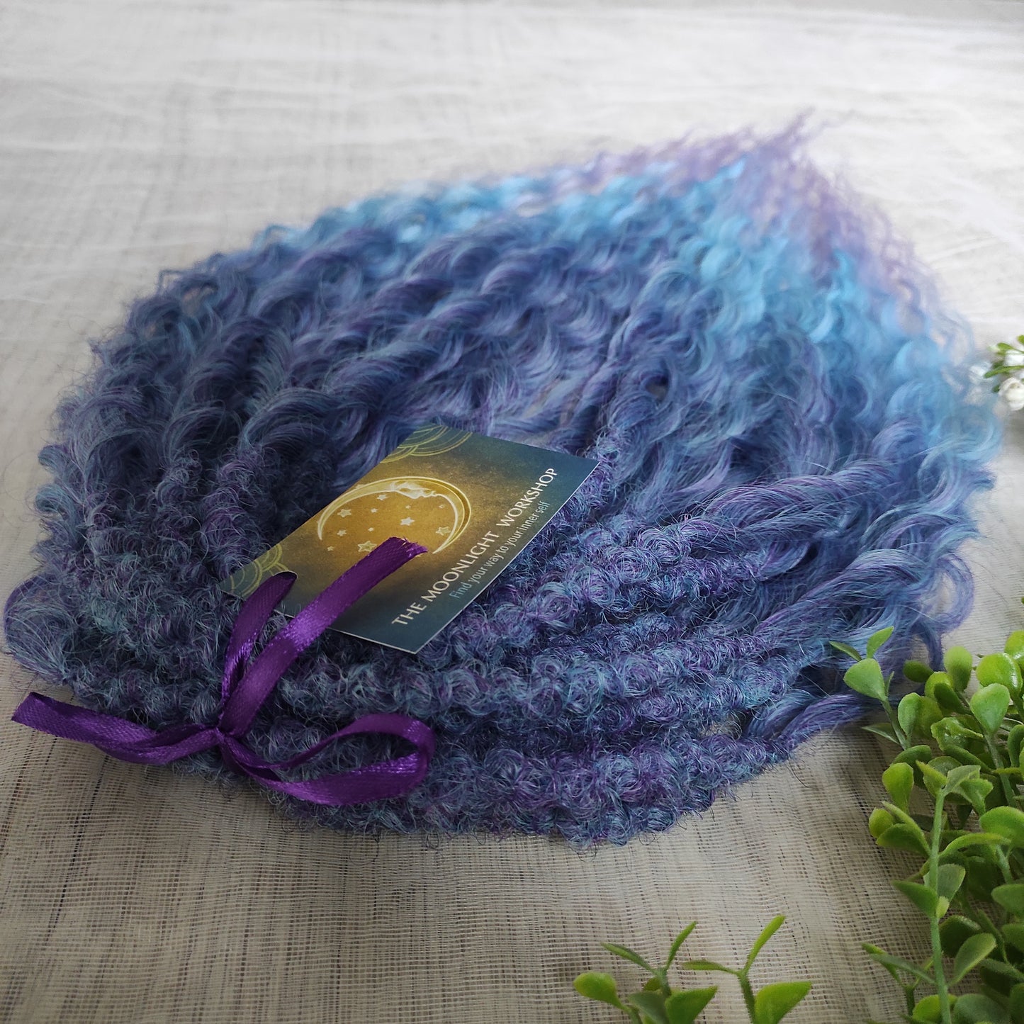 Soft, lightweight, and reusable synthetic sets of double ended regular curls (NOT BRUSHABLE) in blue and purple shades: ombre from indigo to sky blue and lavender.