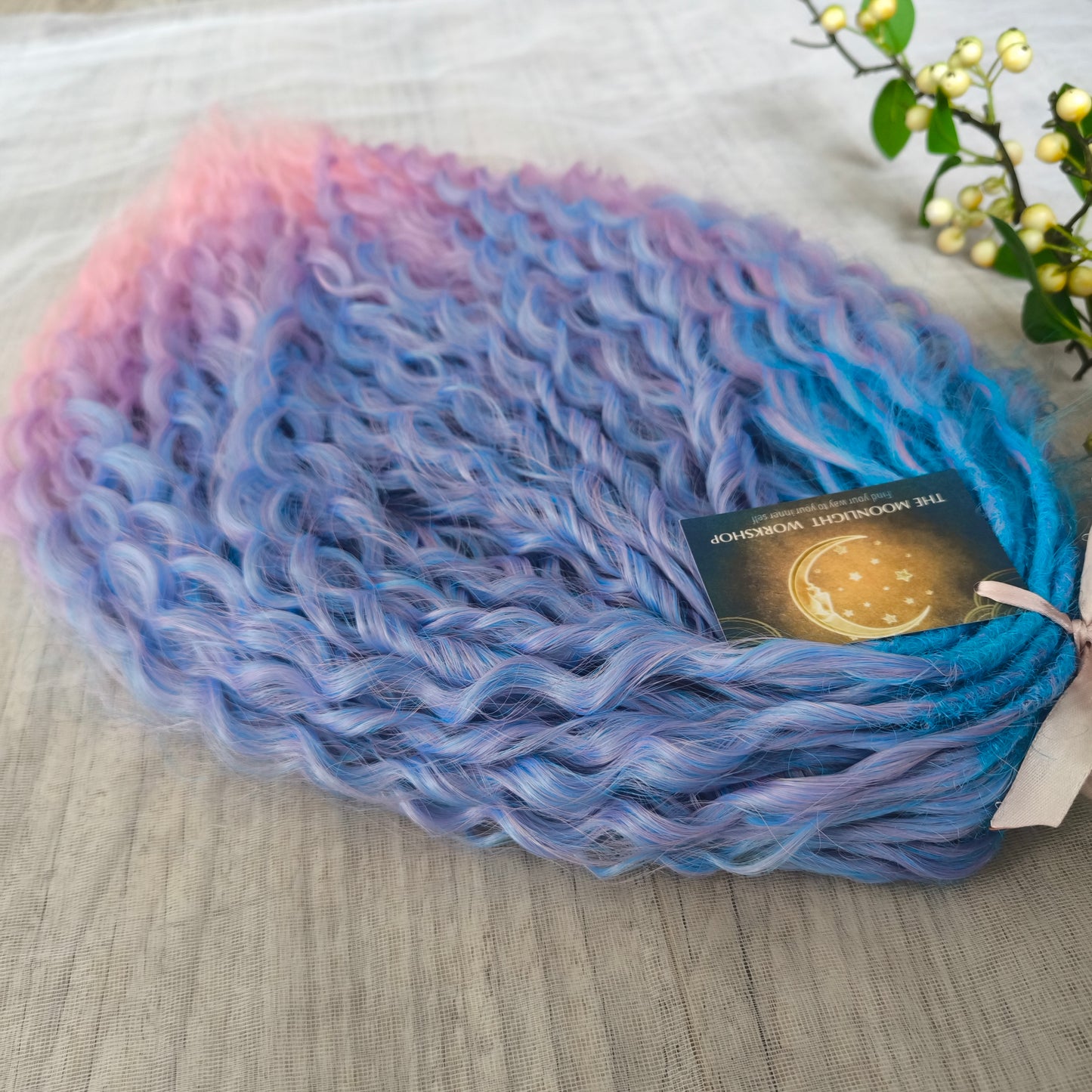 Soft, lightweight, and reusable synthetic sets of double ended regular curls (NOT BRUSHABLE) in blue and purple shades: ombre from sky blue to lavender and pink;