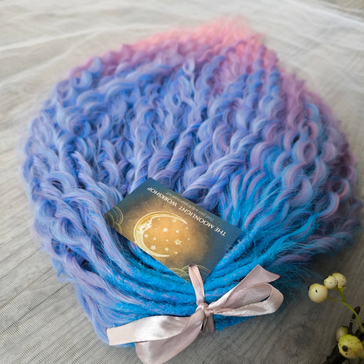 Soft, lightweight, and reusable synthetic sets of double ended regular curls (NOT BRUSHABLE) in blue and purple shades: ombre from sky blue to lavender and pink;