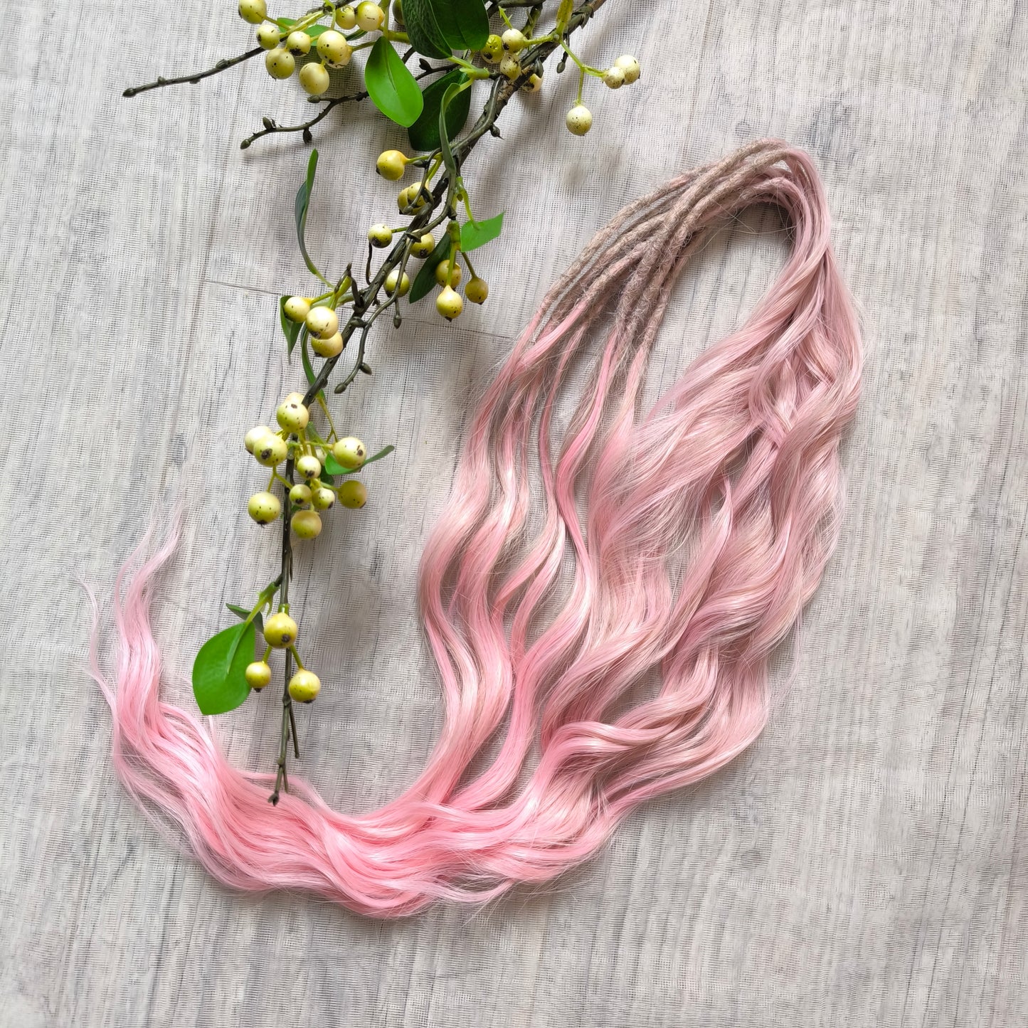 Soft lightweig and reusable brushable curls (regular dreaded, braided middle or pushup): ombre from ash dusty pink to soft pastel pink shade with a powdery undertone adds a touch of sweetness and magic to your style. Perfect for festival vibes, whimsical photo shoots, or simply adding a little fairytale charm to your everyday look.