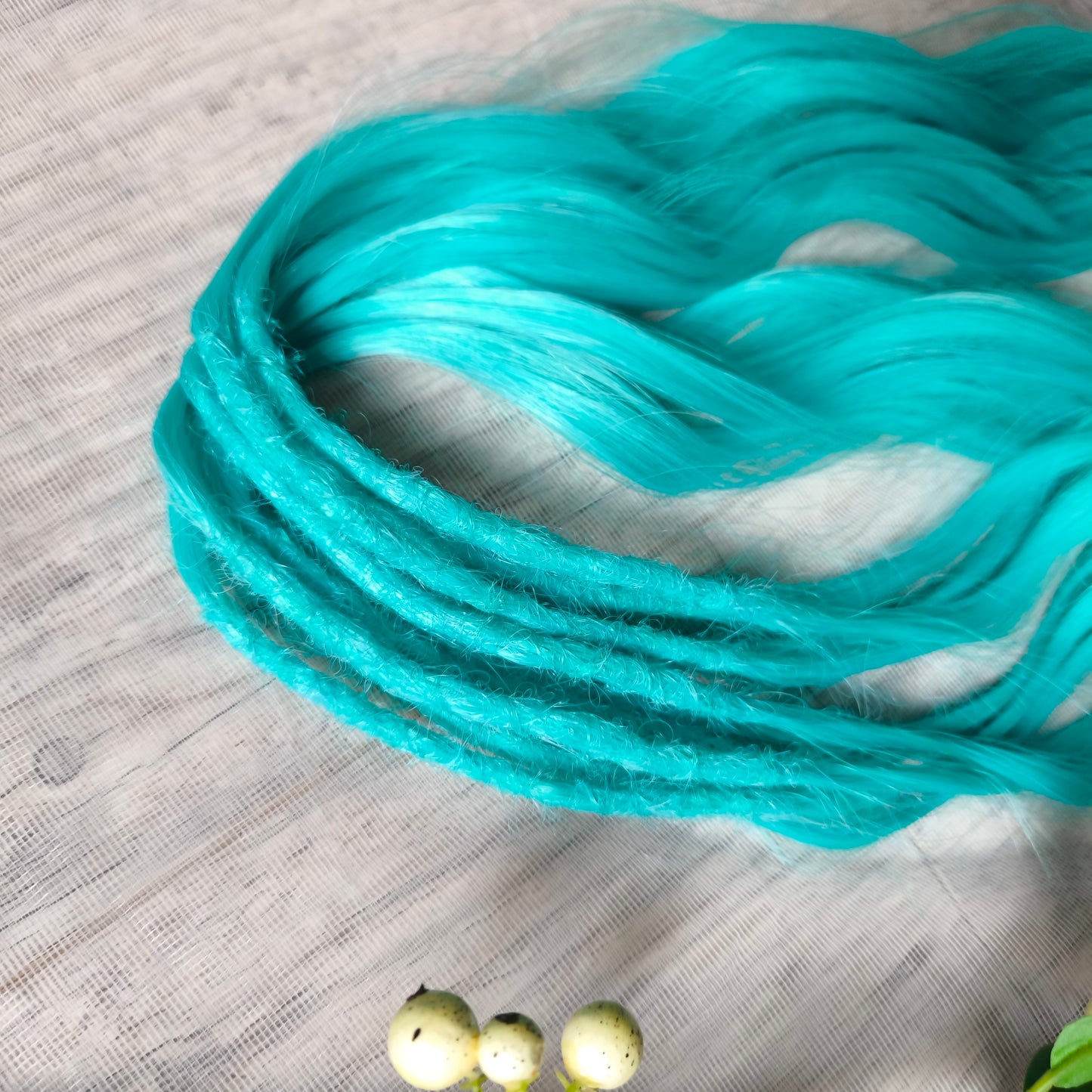 Turquoise green soft, lightweight, and reusable synthetic brushable double-ended wavy dreadlocks (regular dreaded, braided middle or push-up).