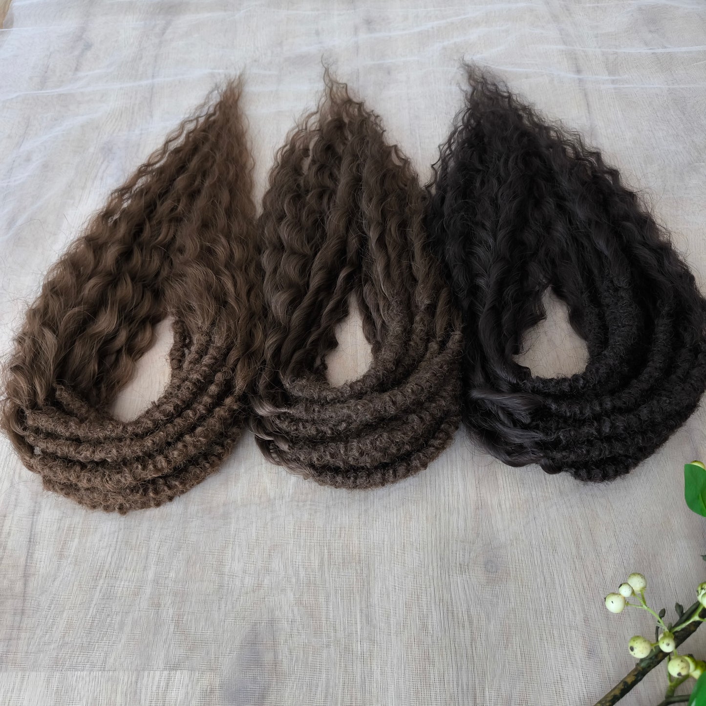 Soft, lightweight, and reusable synthetic sets of regular double ended curls (NOT BRUSHABLE) in brown shades:
1. dark chocolate brown;
2. middle brown
3. light brown