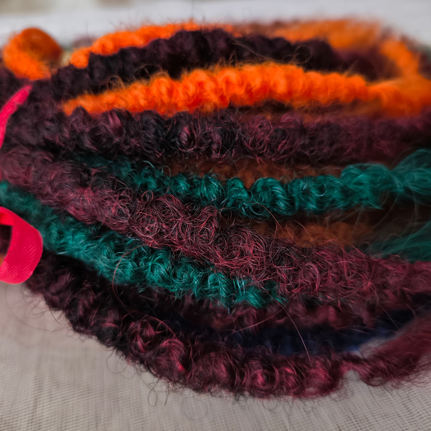 Soft, lightweight, and reusable synthetic double ended regular curls (NOT BRUSHABLE): copper, bronze, burgundy, ombre from chestnut to copper, orange, and green colors.