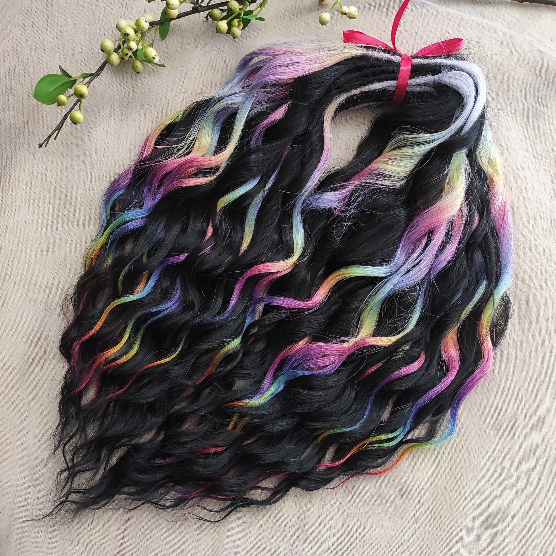 The mix of Black and Rainbow/glitch/prism effect (2/3 parts of black + 1/3 part of rainbow) soft, lightweight, and reusable synthetic brushable double ended wavy dreadlocks.