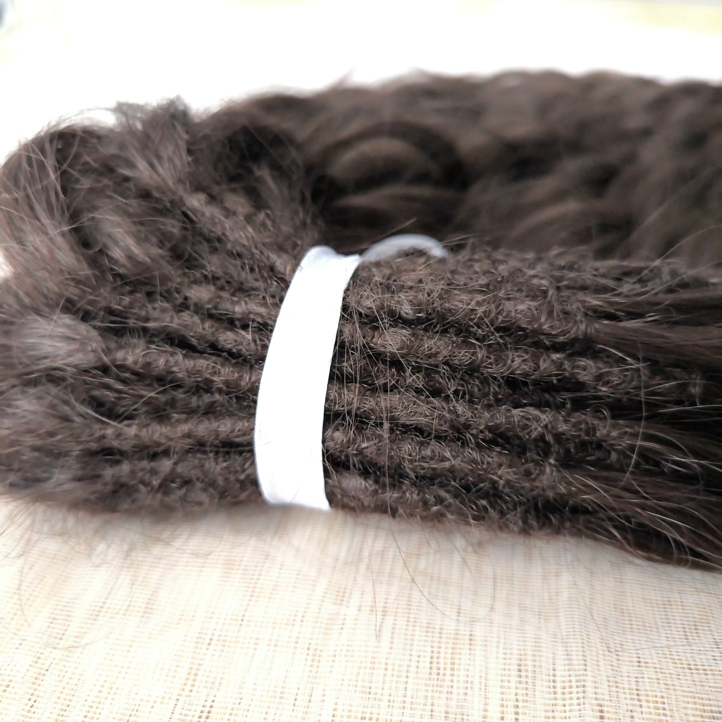 Dark chocolate brown soft, lightweight, and reusable synthetic brushable double ended wavy dreadlocks (regular dreaded or push-up).