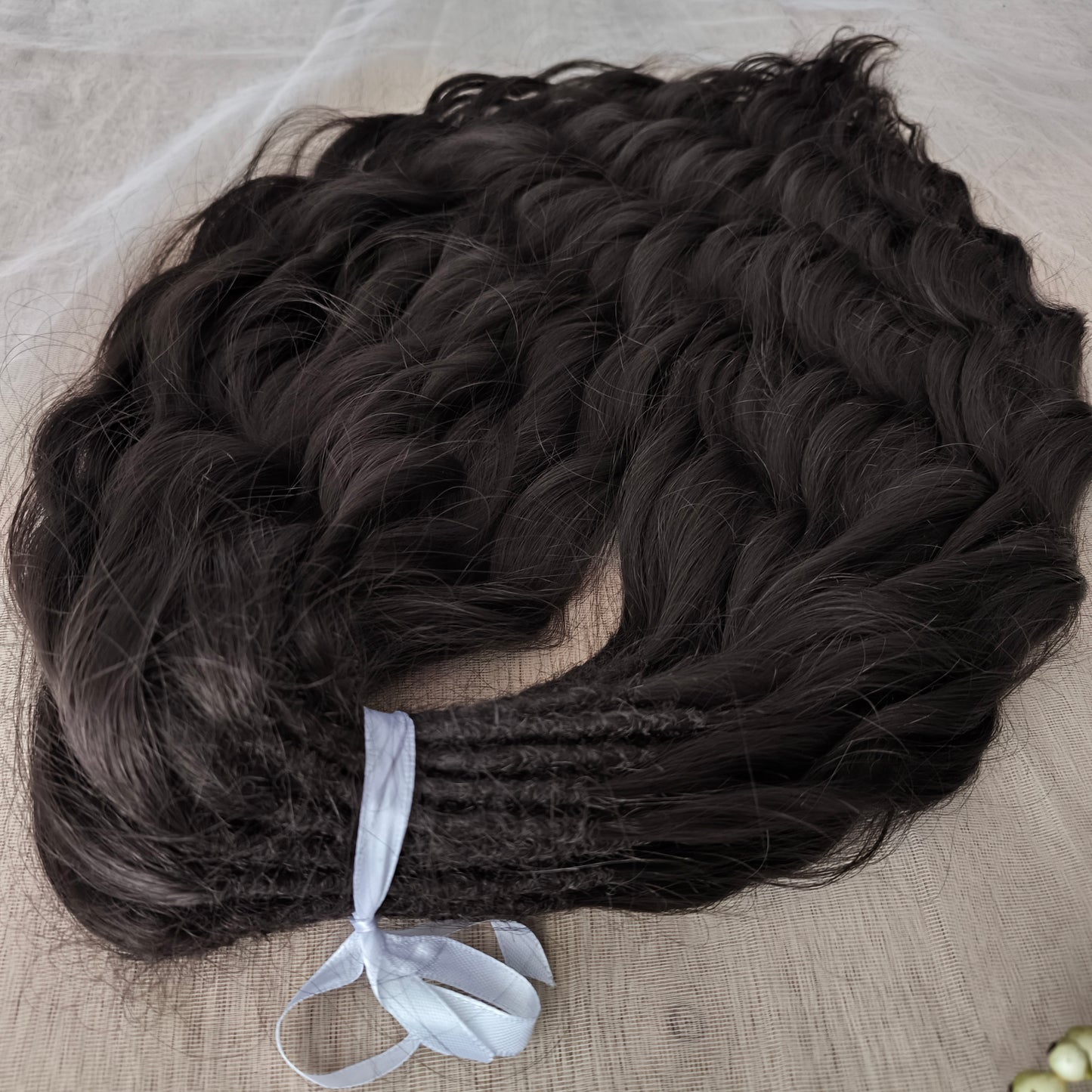 Dark chocolate brown soft, lightweight, and reusable synthetic brushable double ended wavy dreadlocks (regular dreaded or push-up).