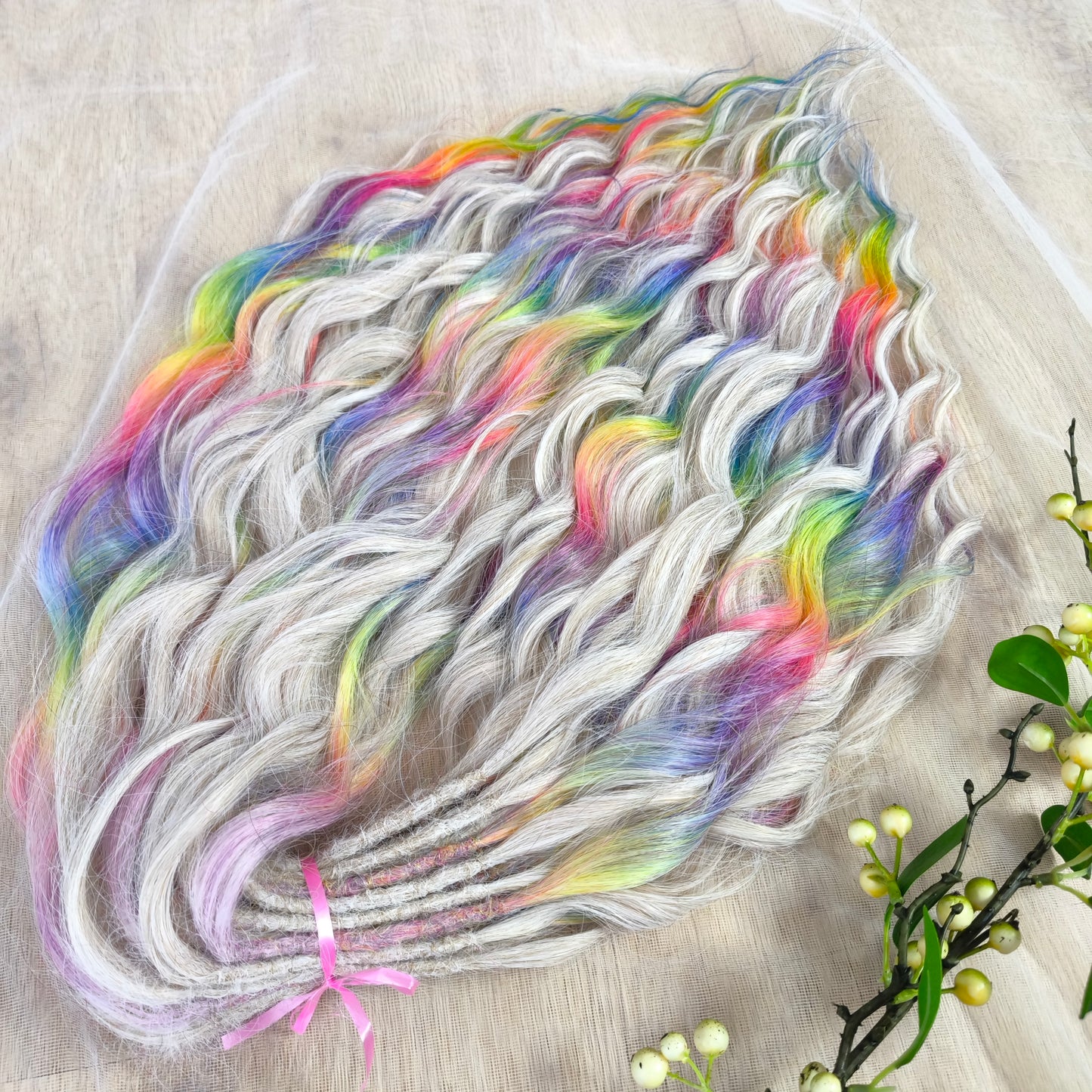 The mix of Platinum blonde and Rainbow/glitch/prism effect (2/3 parts of blonde + 1/3 part of rainbow) soft, lightweight, and reusable synthetic brushable double ended wavy dreadlocks (regular dreaded or push-up).
