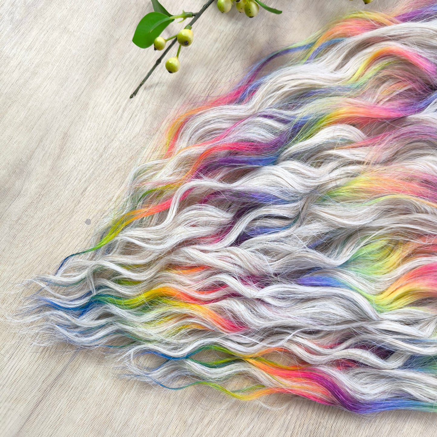 The mix of Platinum blonde and Rainbow/glitch/prism effect (2/3 parts of blonde + 1/3 part of rainbow) soft, lightweight, and reusable synthetic brushable double ended wavy dreadlocks (regular dreaded or push-up).