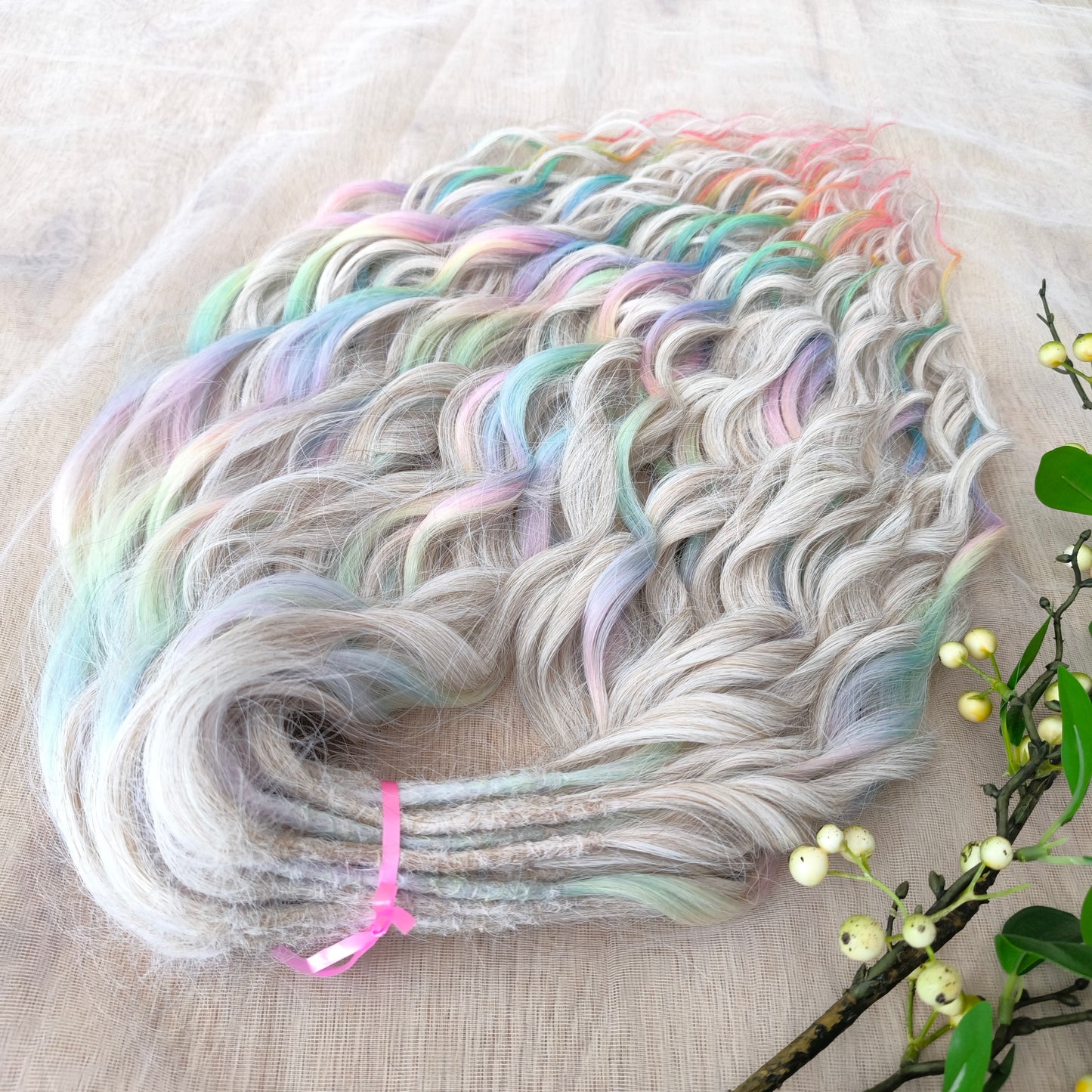 The mix of Platinum blonde and Rainbow/glitch/prism effect (2/3 parts of blonde + 1/3 part of rainbow) soft, lightweight, and reusable synthetic brushable double ended wavy dreadlocks (regular dreaded or push-up).