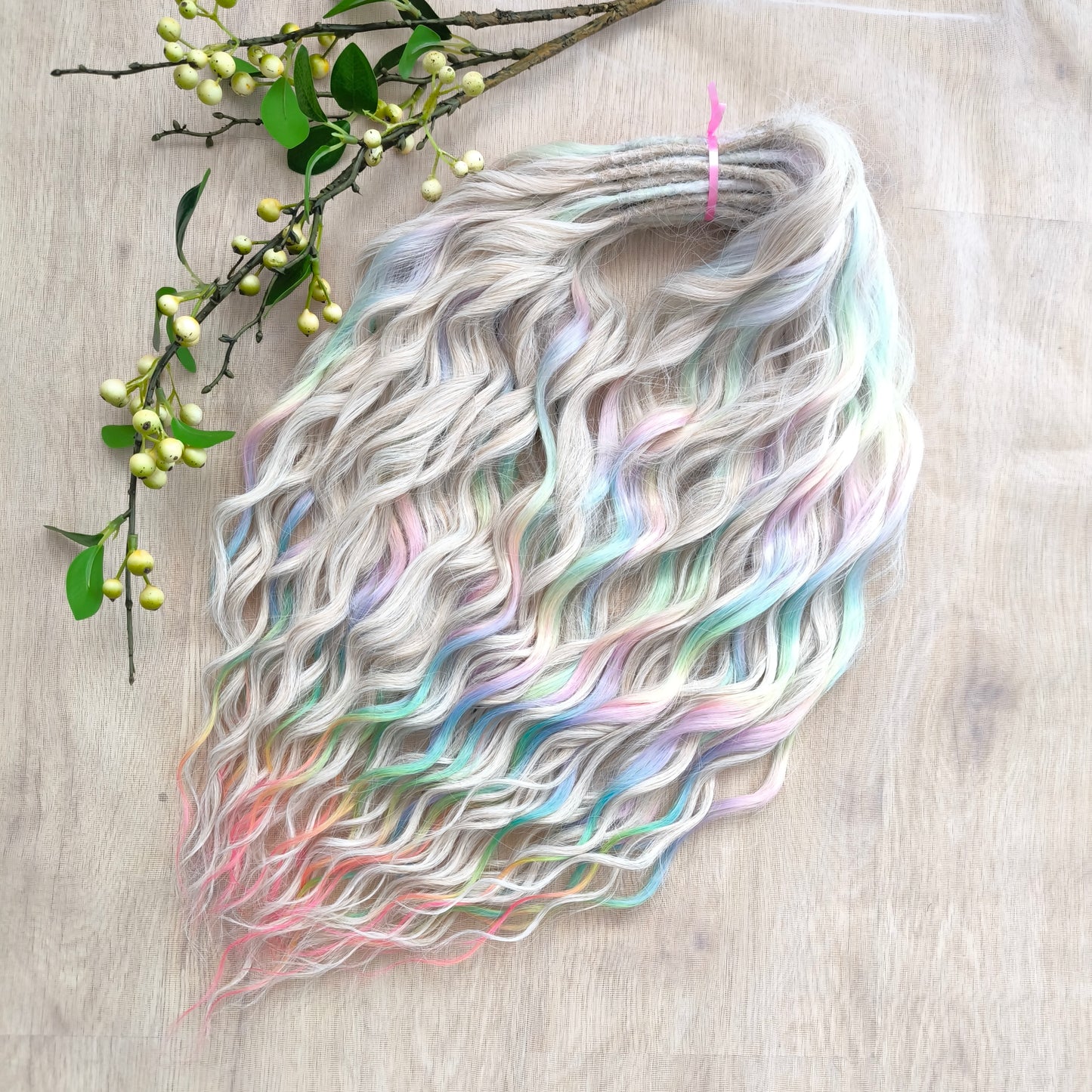 The mix of Platinum blonde and Rainbow/glitch/prism effect (2/3 parts of blonde + 1/3 part of rainbow) soft, lightweight, and reusable synthetic brushable double ended wavy dreadlocks (regular dreaded or push-up).
