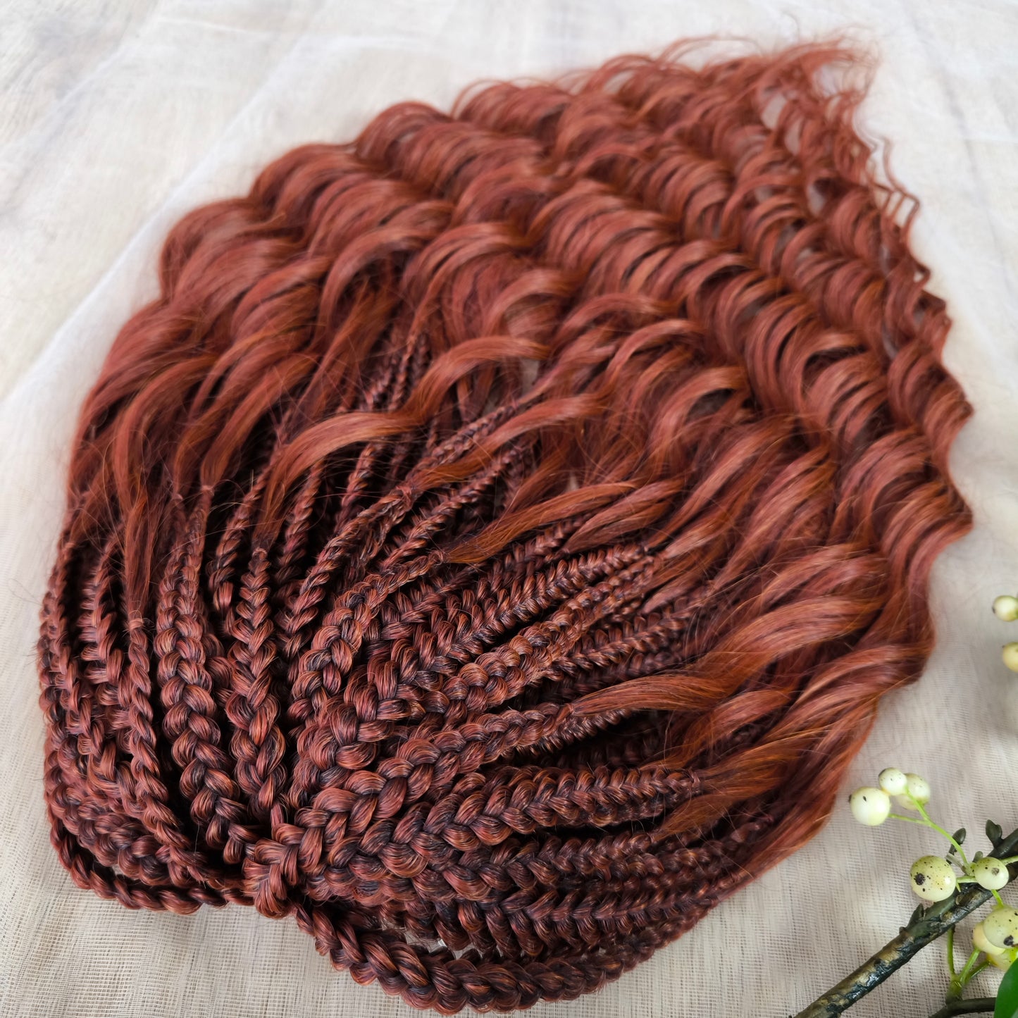 This rich, earthy shade of deep rusty red blends fiery energy with natural elegance — perfect for those who want a bold yet grounded look. Soft, lightweight, and reusable synthetic dreaded curls (standard dreaded, braided middle or push-up). Natural-looking waves let you brush these curls, which keeps them looking good longer!