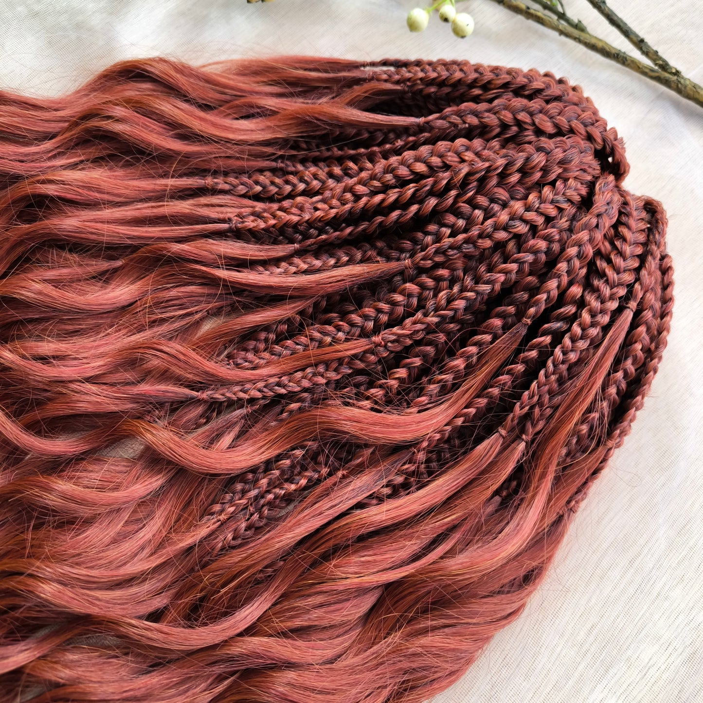 This rich, earthy shade of deep rusty red blends fiery energy with natural elegance — perfect for those who want a bold yet grounded look. Soft, lightweight, and reusable synthetic dreaded curls (standard dreaded, braided middle or push-up). Natural-looking waves let you brush these curls, which keeps them looking good longer!