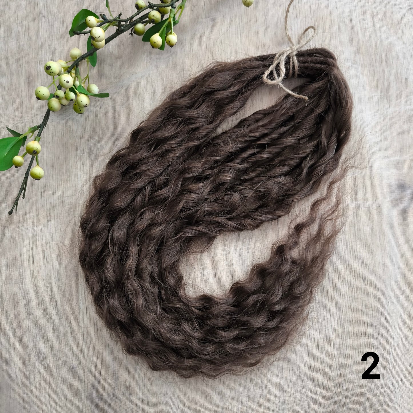 Soft, lightweight, and reusable synthetic sets of regular double ended curls (NOT BRUSHABLE) in brown shades:
1. dark chocolate brown;
2. middle brown
3. light brown