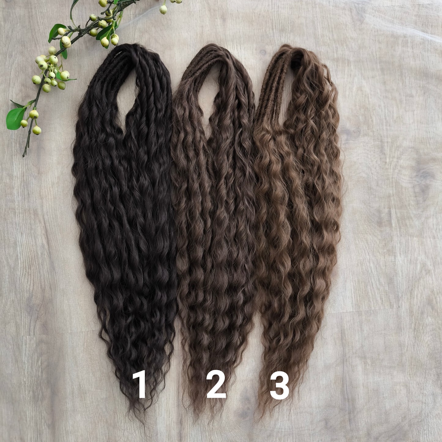 Soft, lightweight, and reusable synthetic sets of regular double ended curls (NOT BRUSHABLE) in brown shades:
1. dark chocolate brown;
2. middle brown
3. light brown