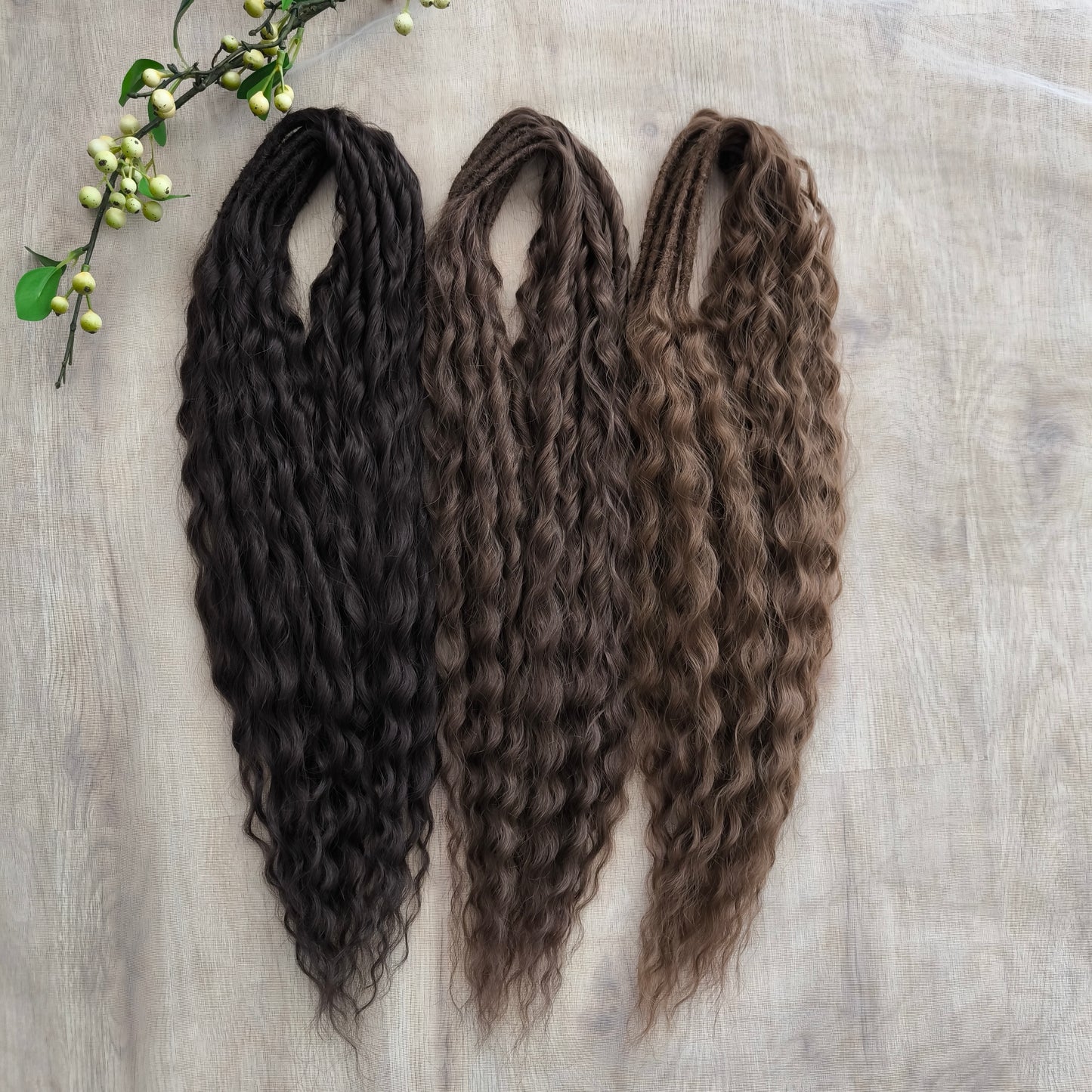 Soft, lightweight, and reusable synthetic sets of regular double ended curls (NOT BRUSHABLE) in brown shades:
1. dark chocolate brown;
2. middle brown
3. light brown