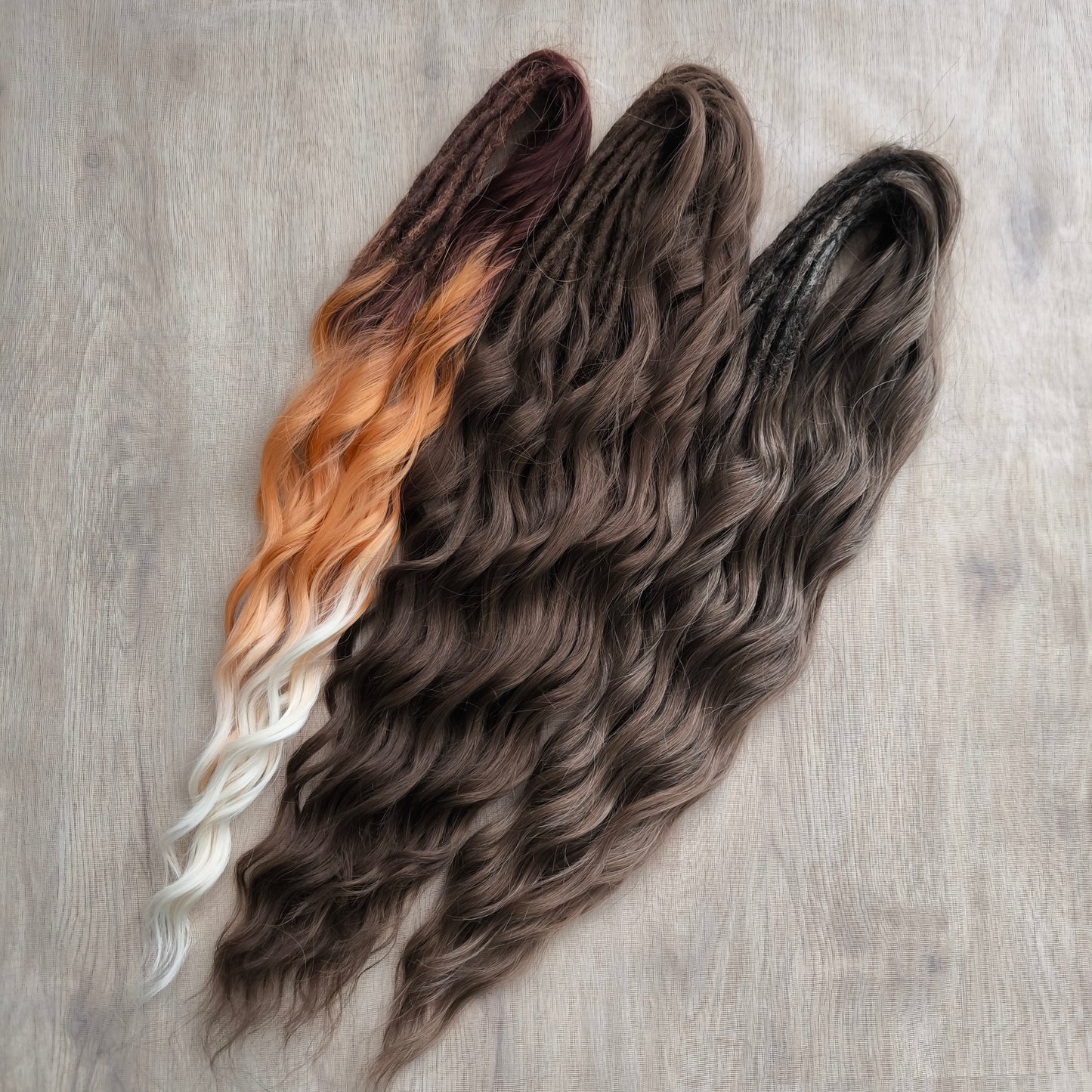 This moody, elegant set of soft, lightweight, and reusable synthetic brushable double-ended wavy dreadlocks features 2 shades of brown as the main color, enriched with calico strands.