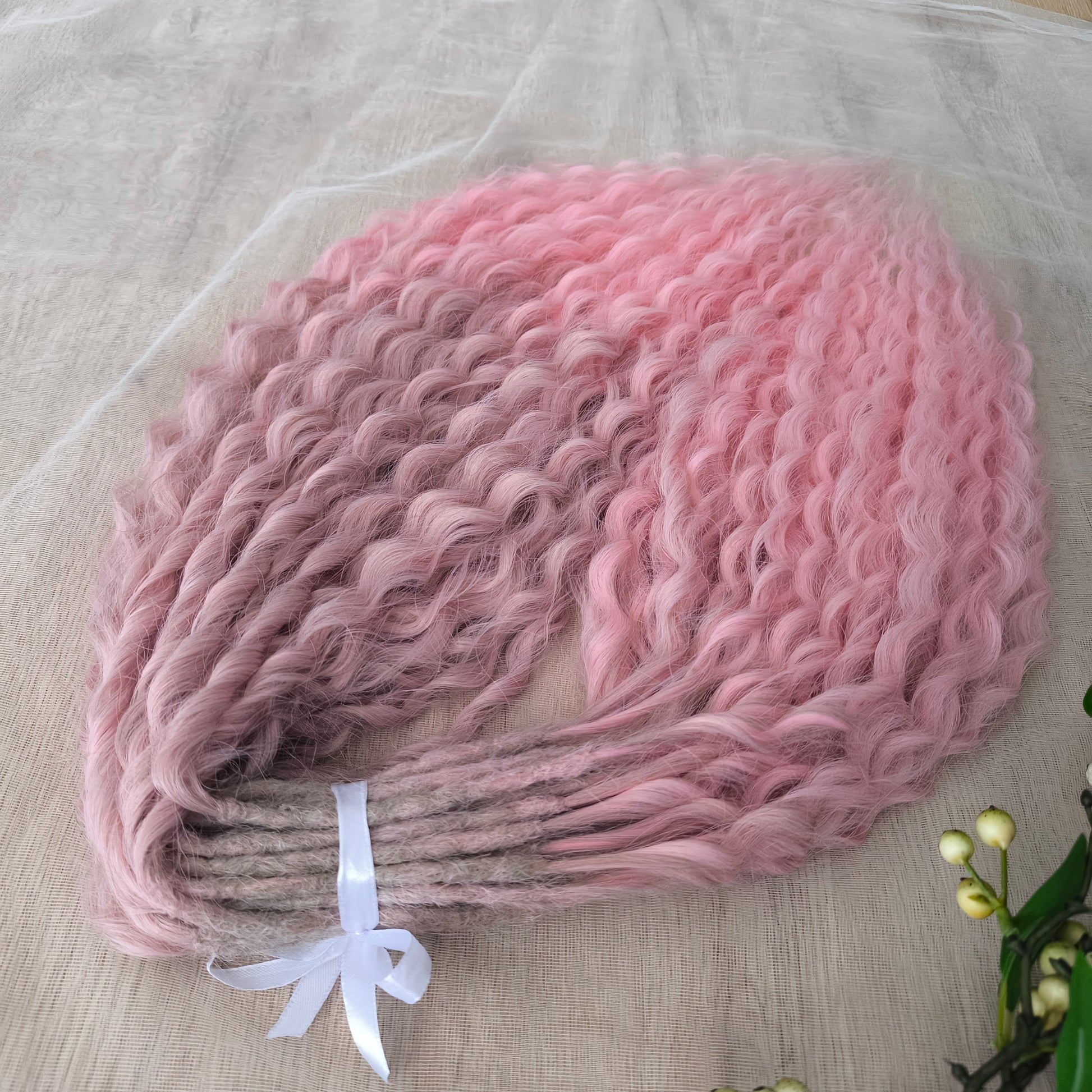 Dusty Rose features a soft pink ombré that fades beautifully from ash dusty rose roots to clean, pastel pink ends. The subtle gradient adds depth and a natural look, while maintaining a romantic, feminine tone.