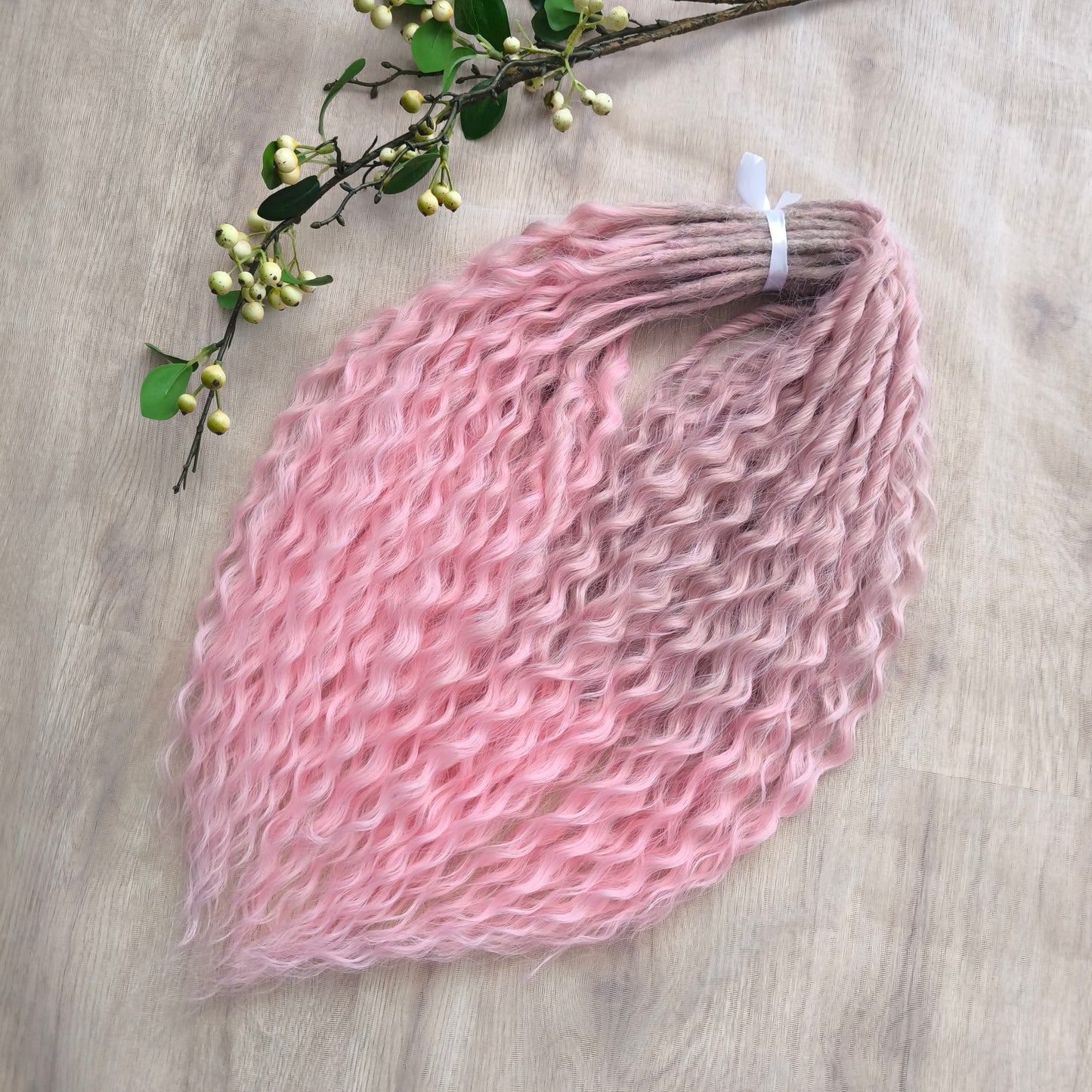 Dusty Rose features a soft pink ombré that fades beautifully from ash dusty rose roots to clean, pastel pink ends. The subtle gradient adds depth and a natural look, while maintaining a romantic, feminine tone.