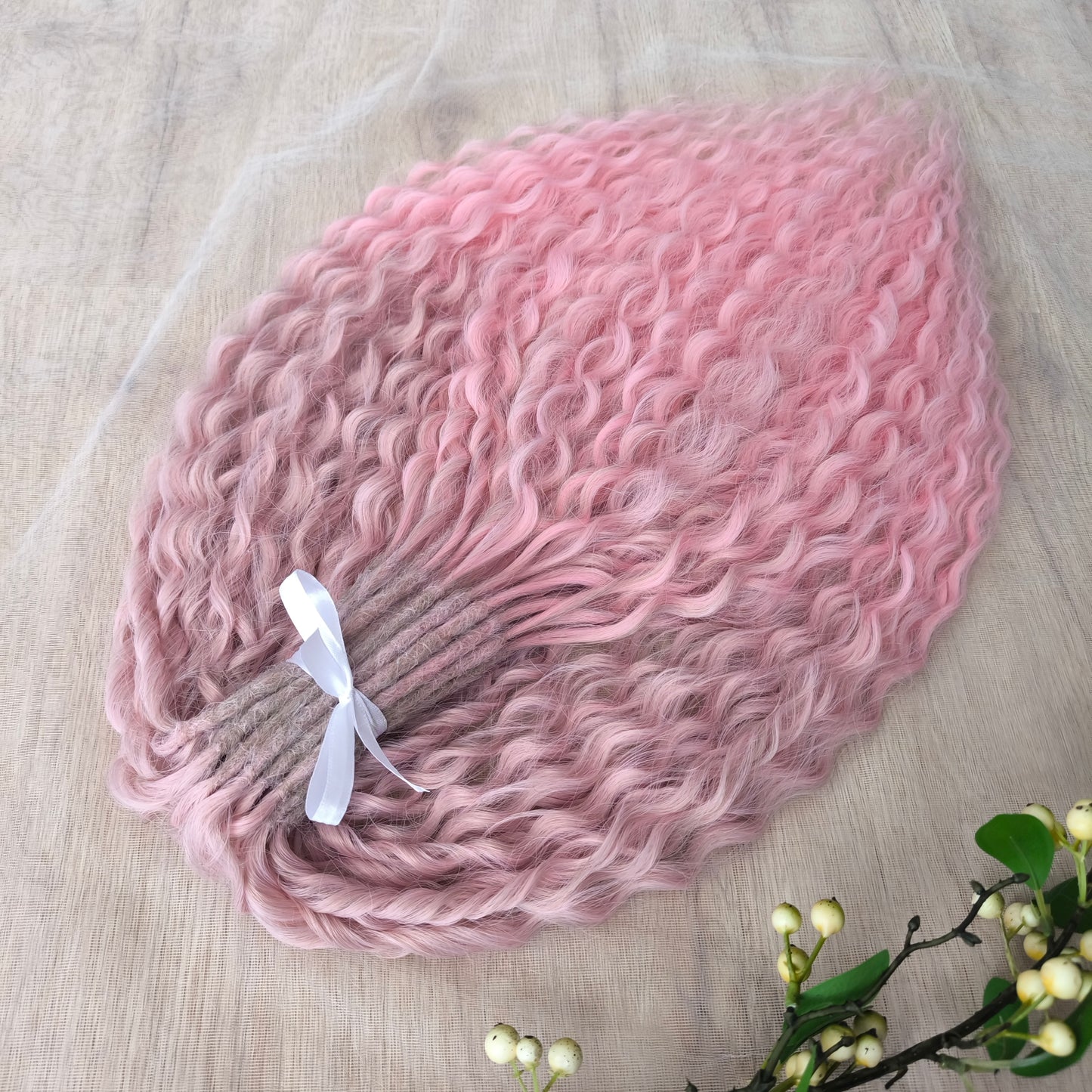 Dusty Rose features a soft pink ombré that fades beautifully from ash dusty rose roots to clean, pastel pink ends. The subtle gradient adds depth and a natural look, while maintaining a romantic, feminine tone.