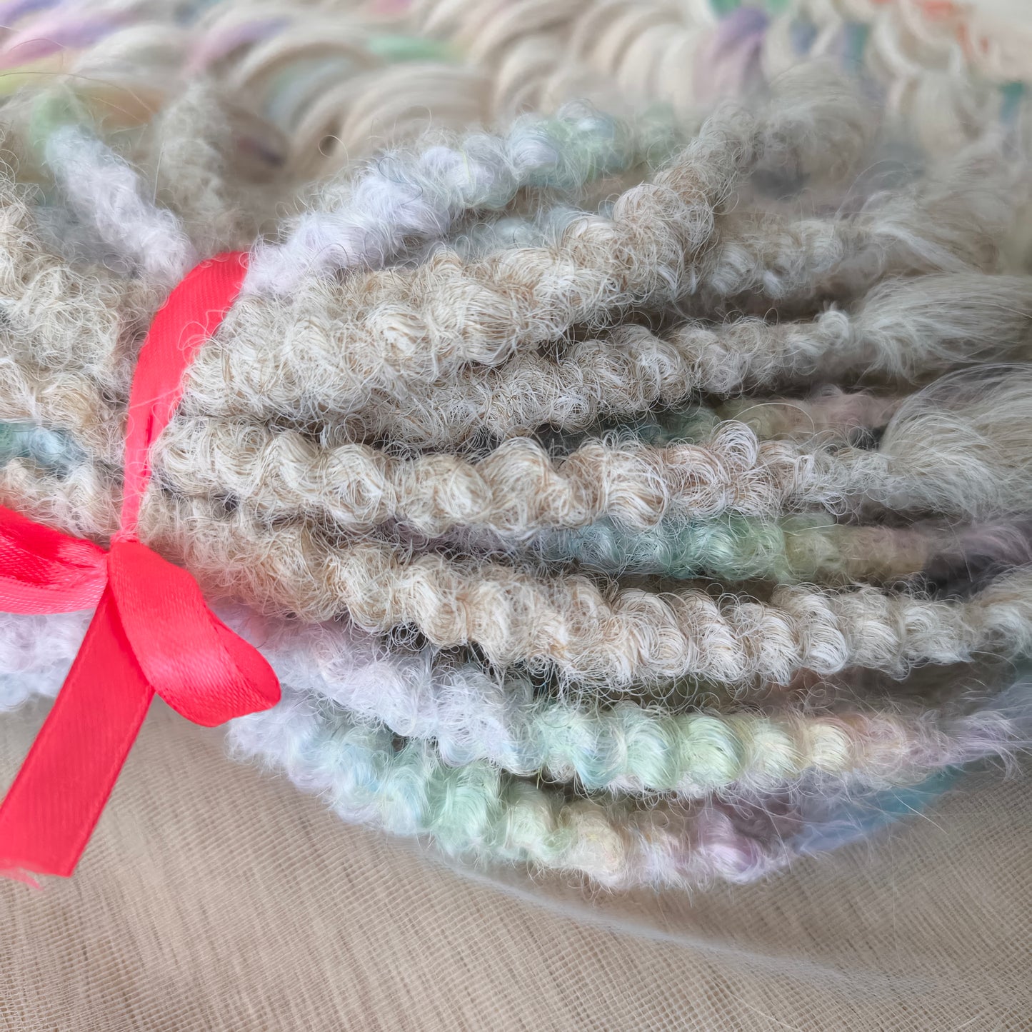 The mix of Platinum blonde and Rainbow/glitch/prism effect (2/3 parts of blonde + 1/3 part of rainbow) soft, lightweight, and reusable synthetic brushable double ended wavy dreadlocks (regular dreaded or push-up).