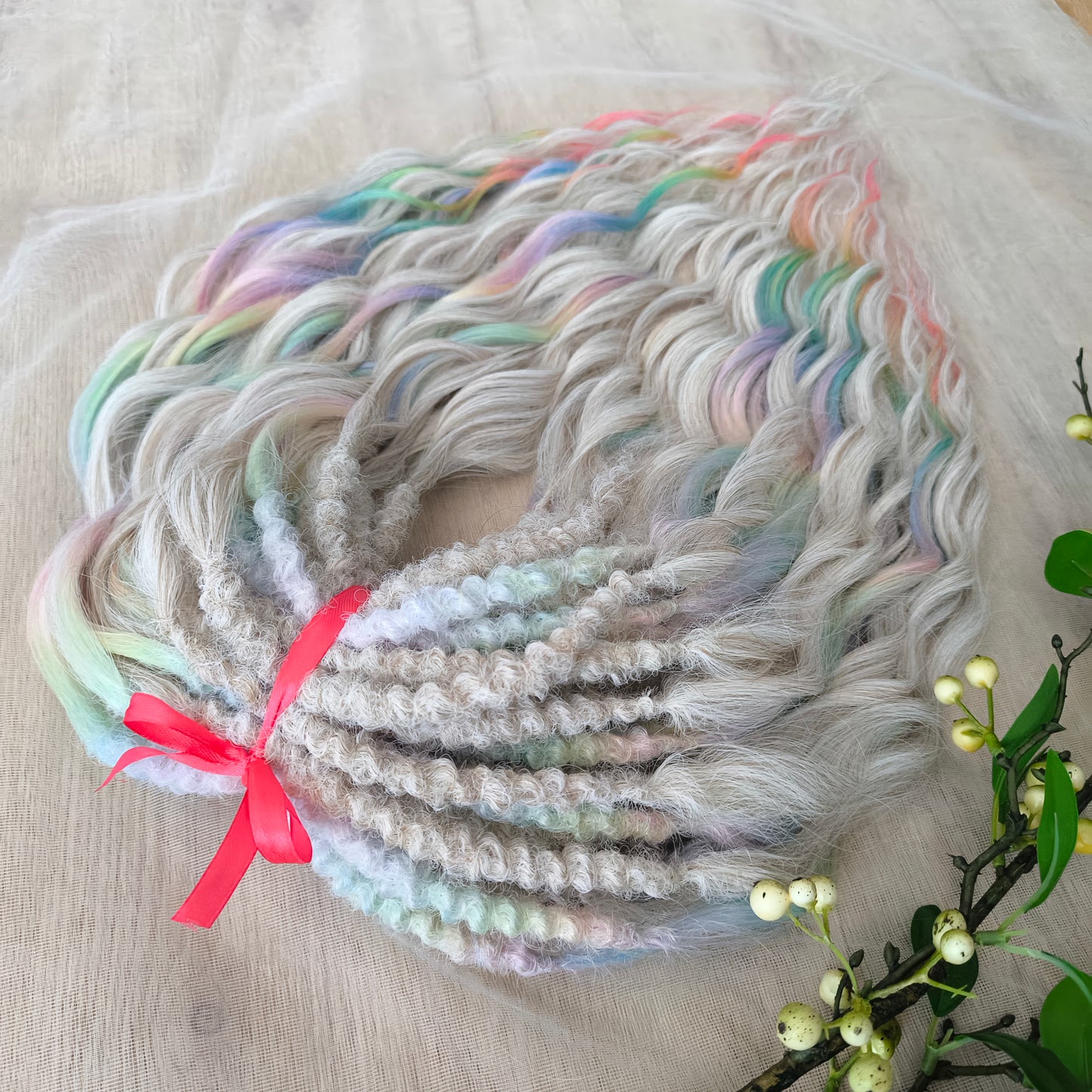 The mix of Platinum blonde and Rainbow/glitch/prism effect (2/3 parts of blonde + 1/3 part of rainbow) soft, lightweight, and reusable synthetic brushable double ended wavy dreadlocks (regular dreaded or push-up).