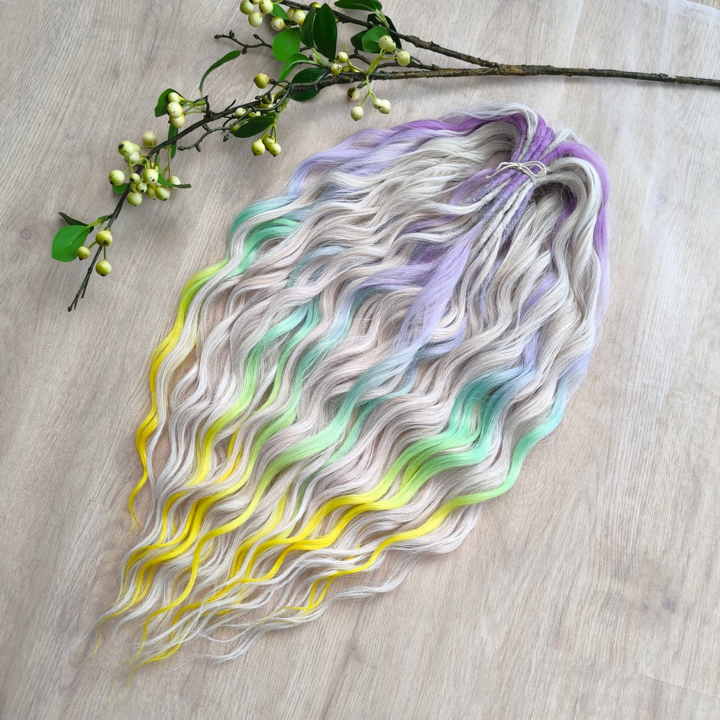The mix of Platinum Blonde and Multicolored ombre from purple/lavender to light green and yellow soft, lightweight, and reusable synthetic brushable double ended wavy dreadlocks (regular dreaded or push-up): 2/3 parts of blonde + 1/3 part of rainbow