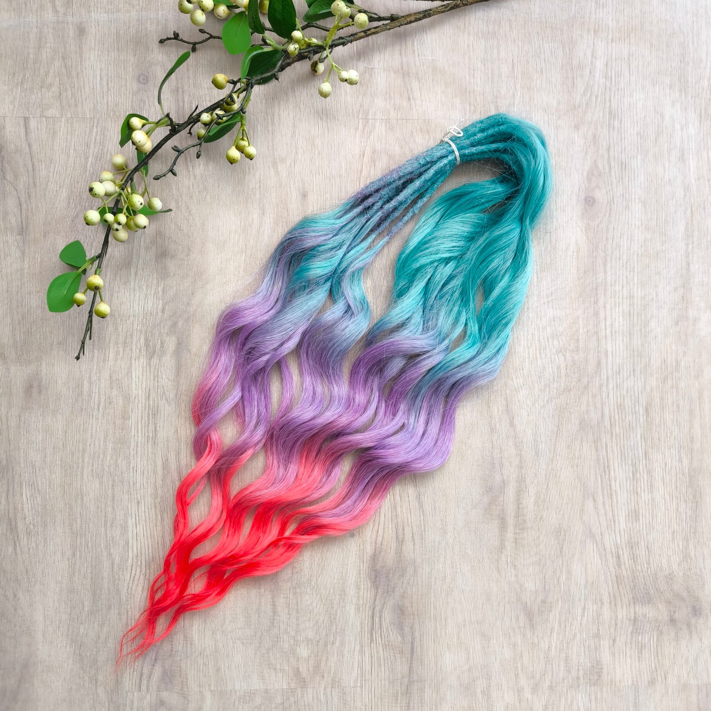 Colorful Rainbow prism (ombre from green to purple and red), soft, lightweight, and reusable synthetic sets of wavy double ended brushable dreadlocks.