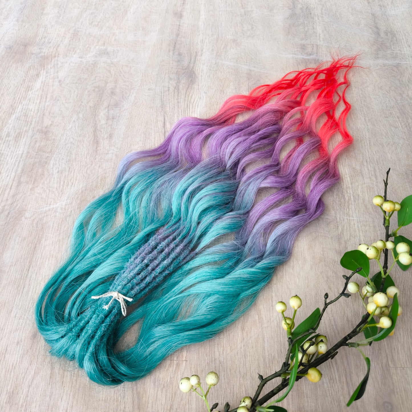 Colorful Rainbow prism (ombre from green to purple and red), soft, lightweight, and reusable synthetic sets of wavy double ended brushable dreadlocks.