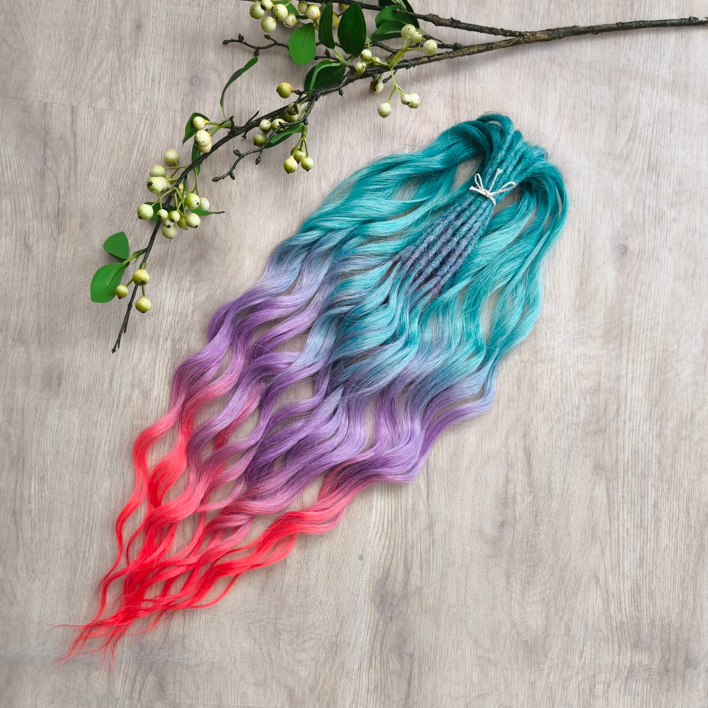 Colorful Rainbow prism (ombre from green to purple and red), soft, lightweight, and reusable synthetic sets of wavy double ended brushable dreadlocks.