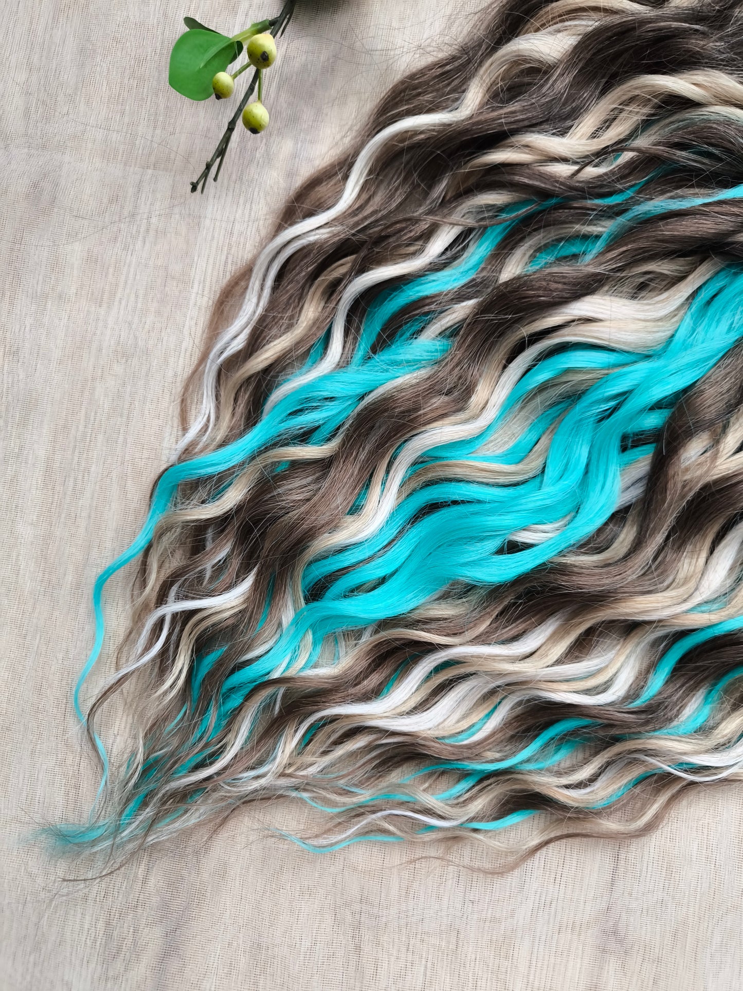 Brown, 2 shades of blonde, and turquoise green soft, lightweight, and reusable synthetic brushable double-ended wavy dreadlocks (regular dreaded or push-up)
