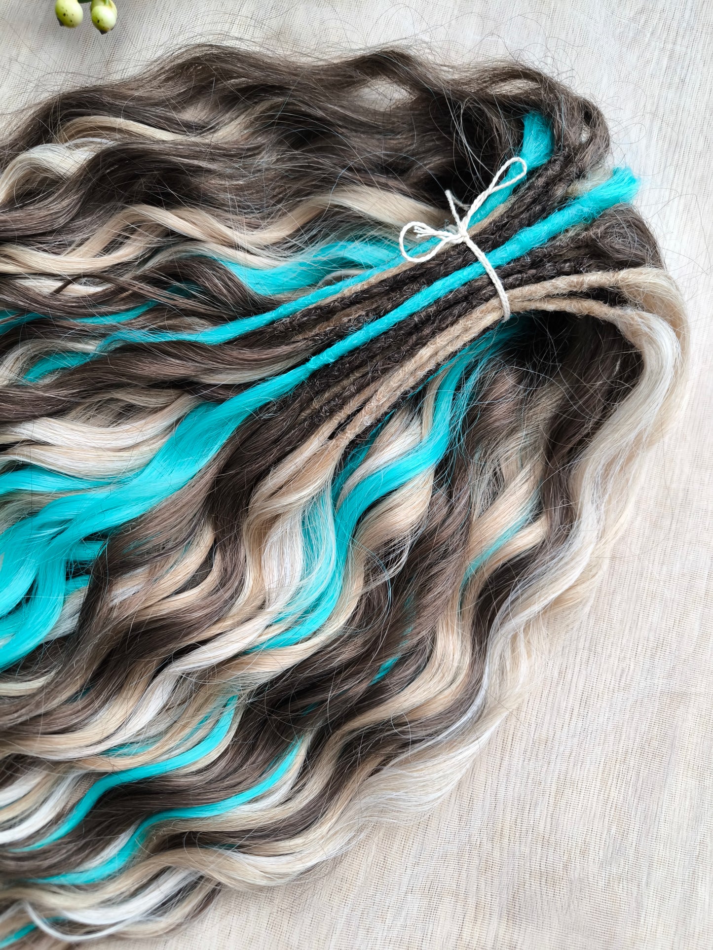 Brown, 2 shades of blonde, and turquoise green soft, lightweight, and reusable synthetic brushable double-ended wavy dreadlocks (regular dreaded or push-up)