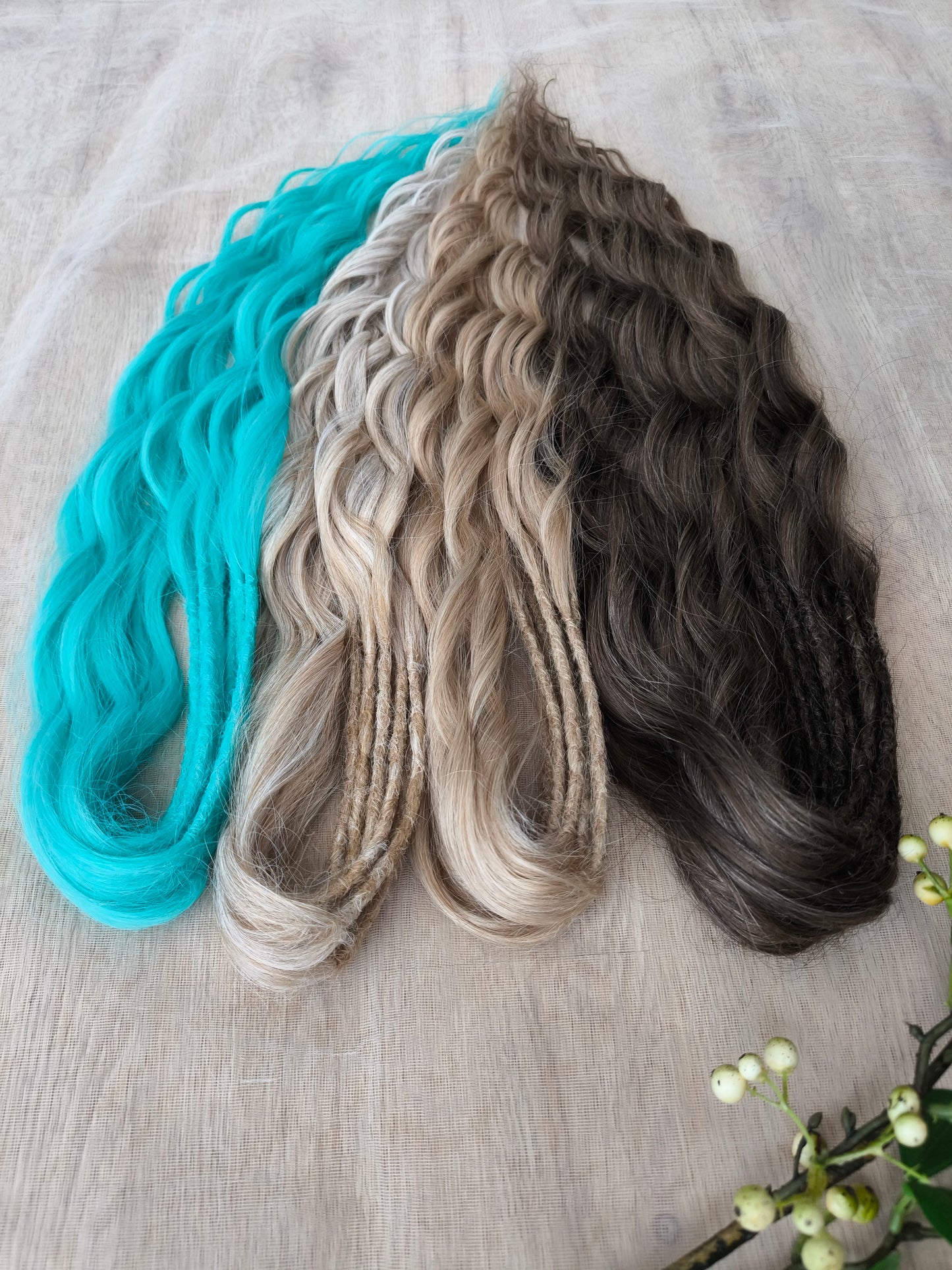 Brown, 2 shades of blonde, and turquoise green soft, lightweight, and reusable synthetic brushable double-ended wavy dreadlocks (regular dreaded or push-up)