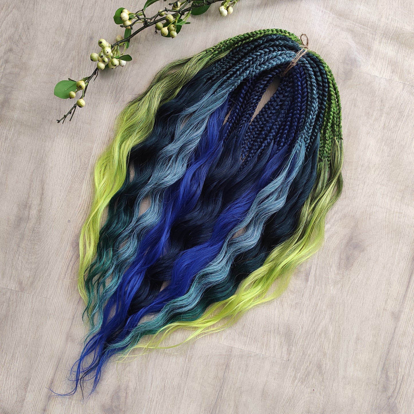 Inspired by the feathers of a peacock and the magic of the deep forest, this set blends rich navy, electric blue, moss green, lime, and seafoam in an eye-catching gradient. Whether you're stepping into a festival or simply expressing your wild side, this look makes a powerful statement.
Soft, lightweight, and reusable synthetic brushable double ended wavy dreadlocks, a mix of Anna and Body wave (available as regular dreaded, braided middle, or push-up).