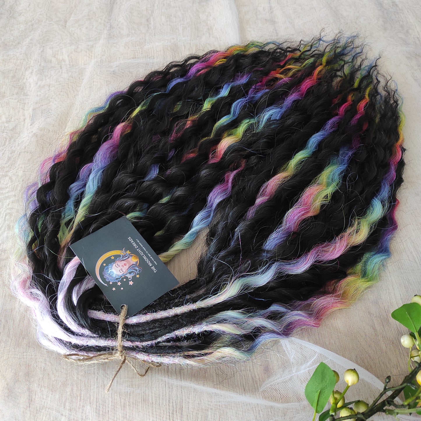 The mix of Black and Rainbow/glitch/prism effect soft, lightweight, and reusable synthetic brushable double ended wavy dreadlocks (NOT BRUSHABLE).