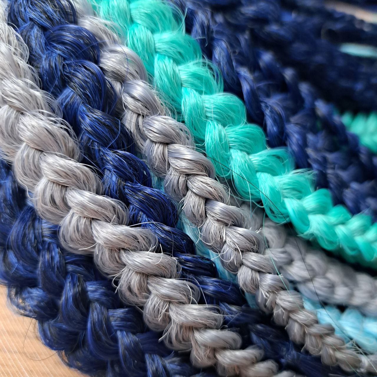 Dive into the deep with Ocean Storm - a powerful mix of midnight and navy blue, turquoise, teal, and icy silver that flows like wild ocean waves. Bold, refreshing, and mysterious - this set is perfect for those who love dramatic contrasts and want their look to stand out.
Soft, lightweight, and reusable custom synthetic brushable double ended curls, a mix of Anna and Body wave (regular dreaded, braided middle or push-up).