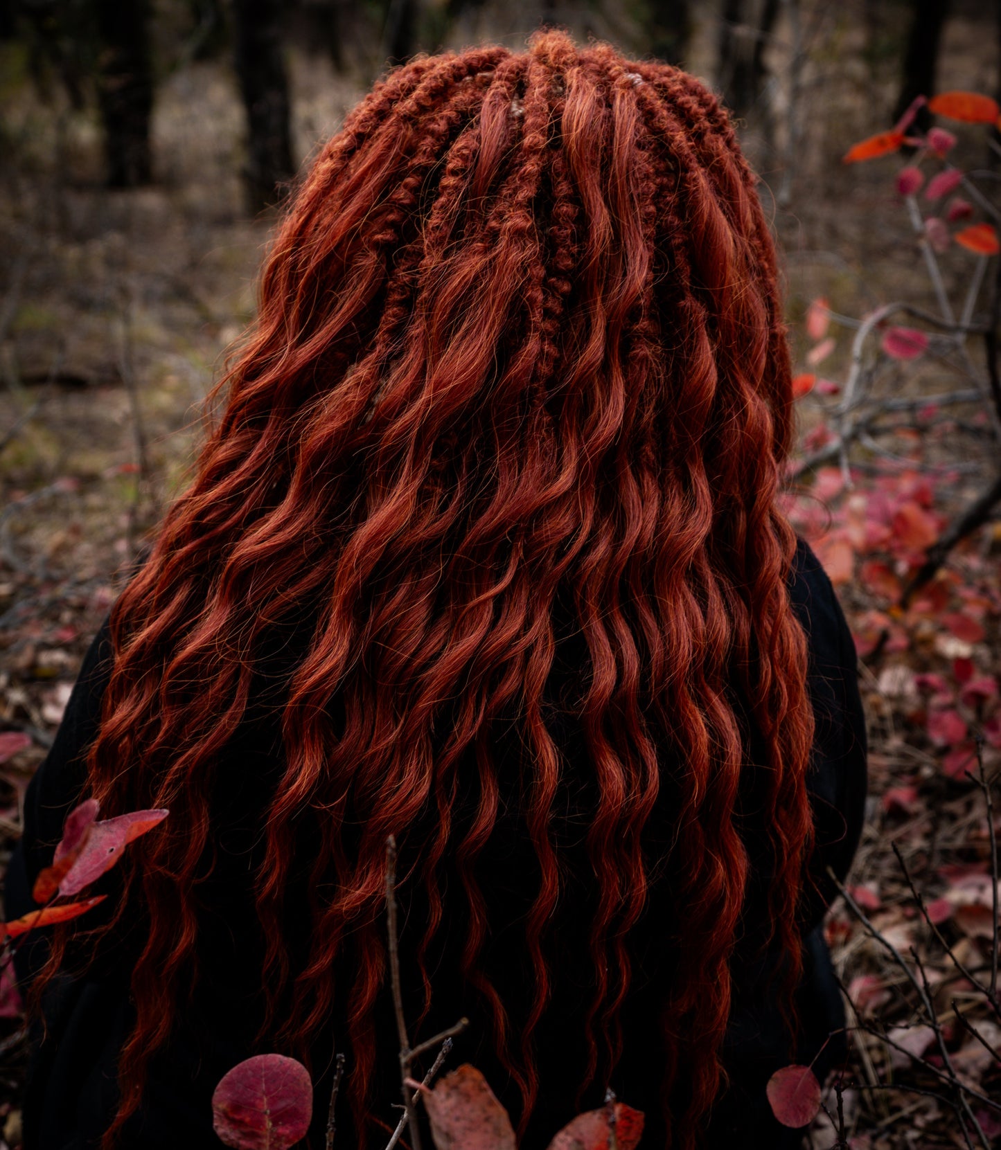 This rich, earthy shade of deep rusty red blends fiery energy with natural elegance — perfect for those who want a bold yet grounded look. Soft, lightweight, and reusable synthetic dreaded curls (standard dreaded, braided middle or push-up). Natural-looking waves let you brush these curls, which keeps them looking good longer!