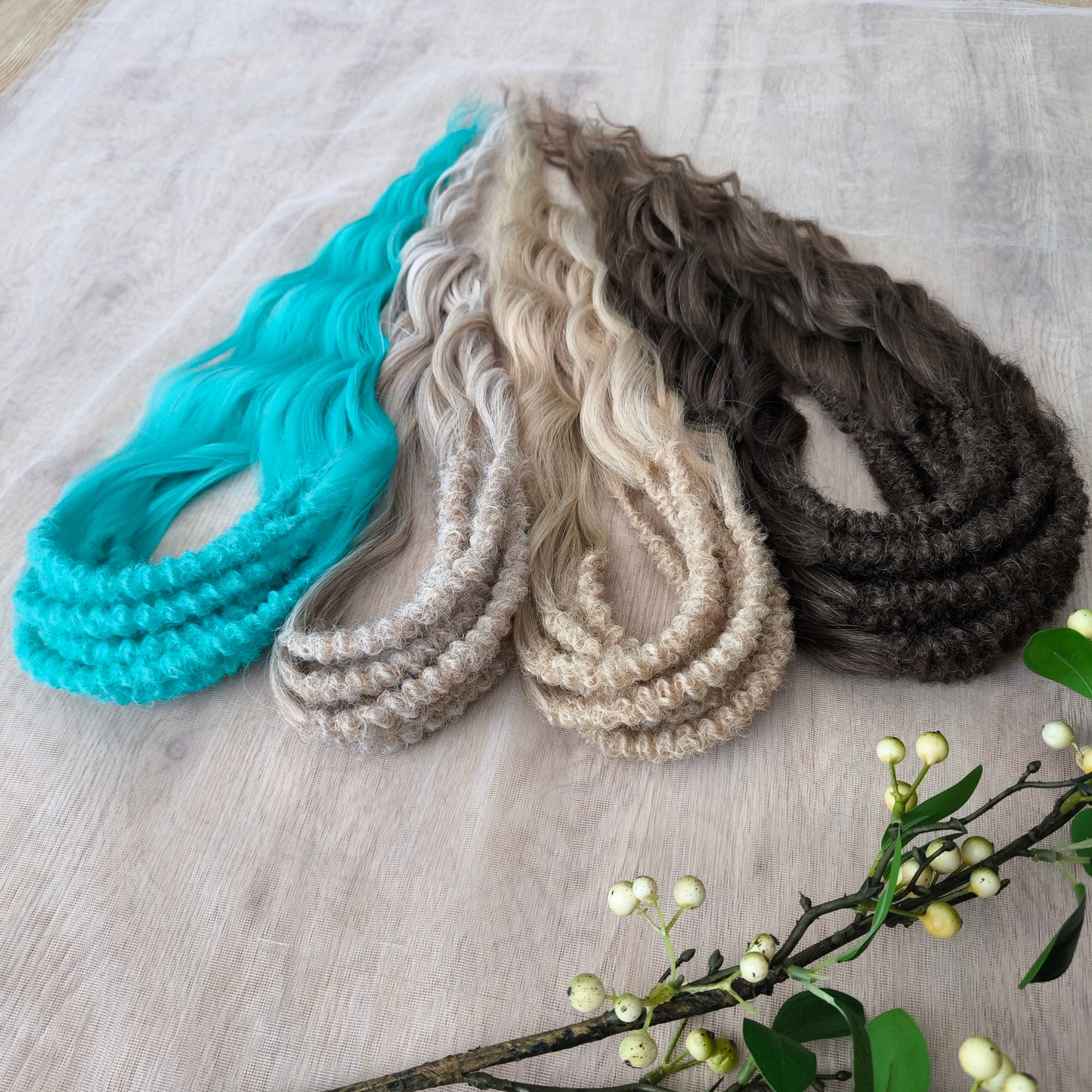 Arctic Mocha: mix of brown, blonde, and turquoise BRUSHABLE synthetic DE dreaded curls (regular, braided middle or push-up)