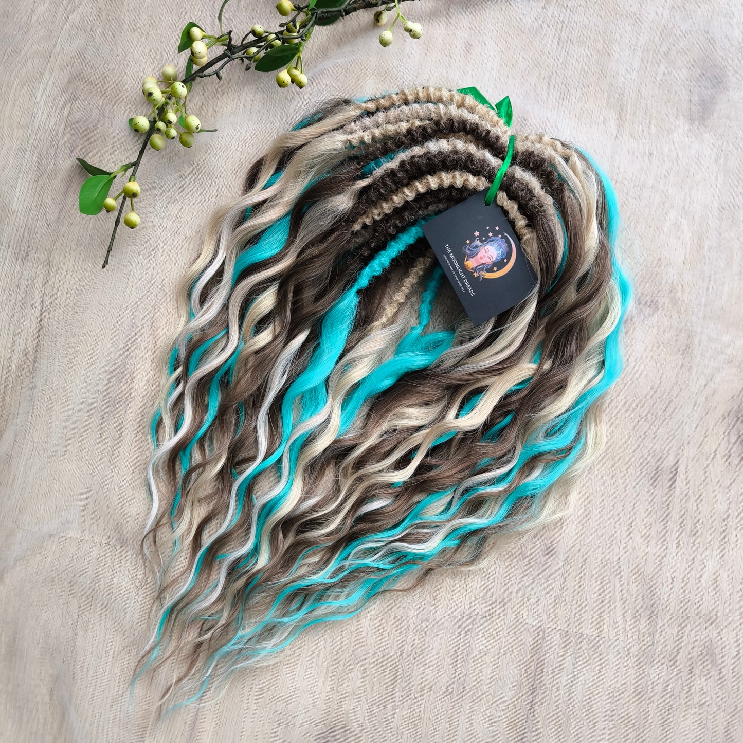 Brown, 2 shades of blonde, and turquoise green soft, lightweight, and reusable synthetic brushable double-ended wavy dreadlocks (regular dreaded or push-up)
