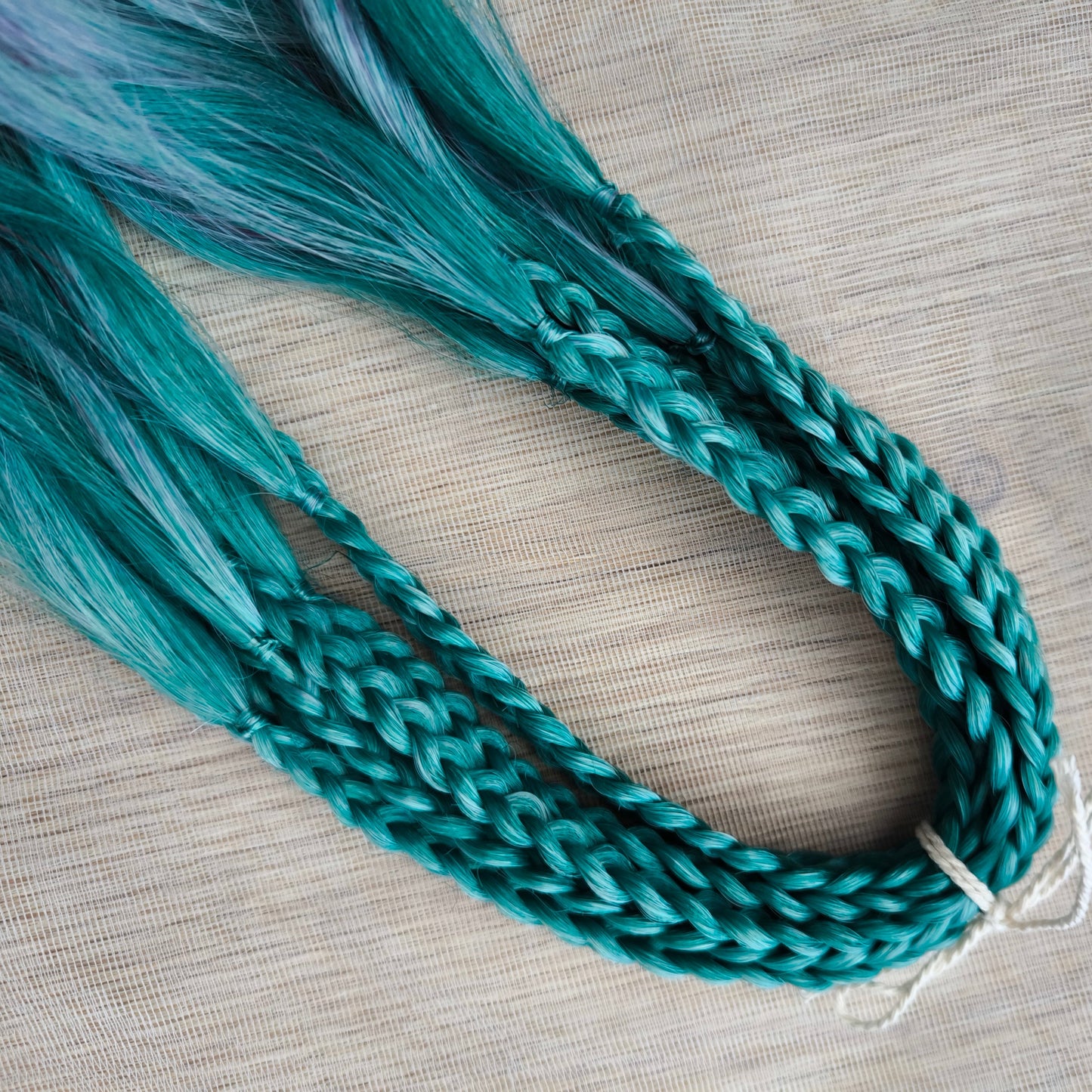 Colorful Rainbow prism (ombre from green to purple and red), soft, lightweight, and reusable synthetic sets of wavy double ended brushable dreadlocks.