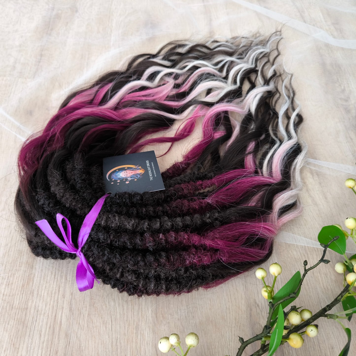 Velvet Twilight - handcrafted set features a rich gradient of deep chocolate brown, dark berry, magenta, and icy platinum - perfect for those who love a dramatic yet elegant look.
Soft, lightweight, and reusable synthetic brushable double ended wavy dreadlocks.
